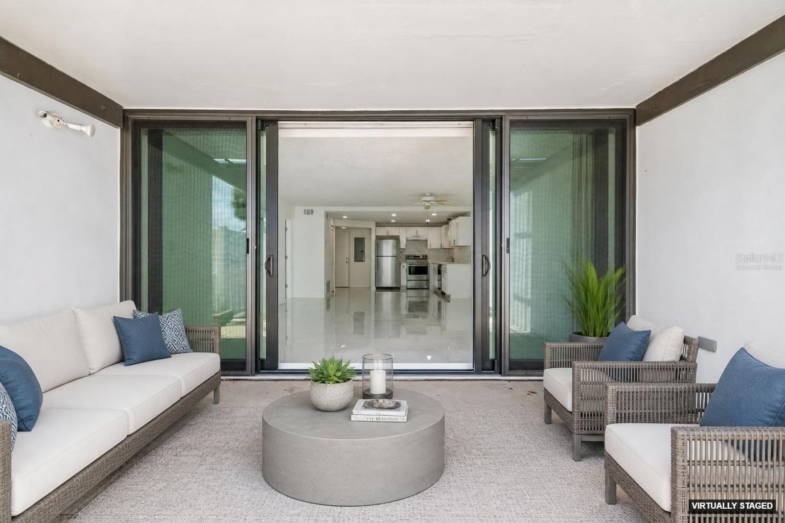 VIRTUALLY STAGED PATIO - 450 TREASURE ISLAND CSWY #106, TREASURE ISLAND