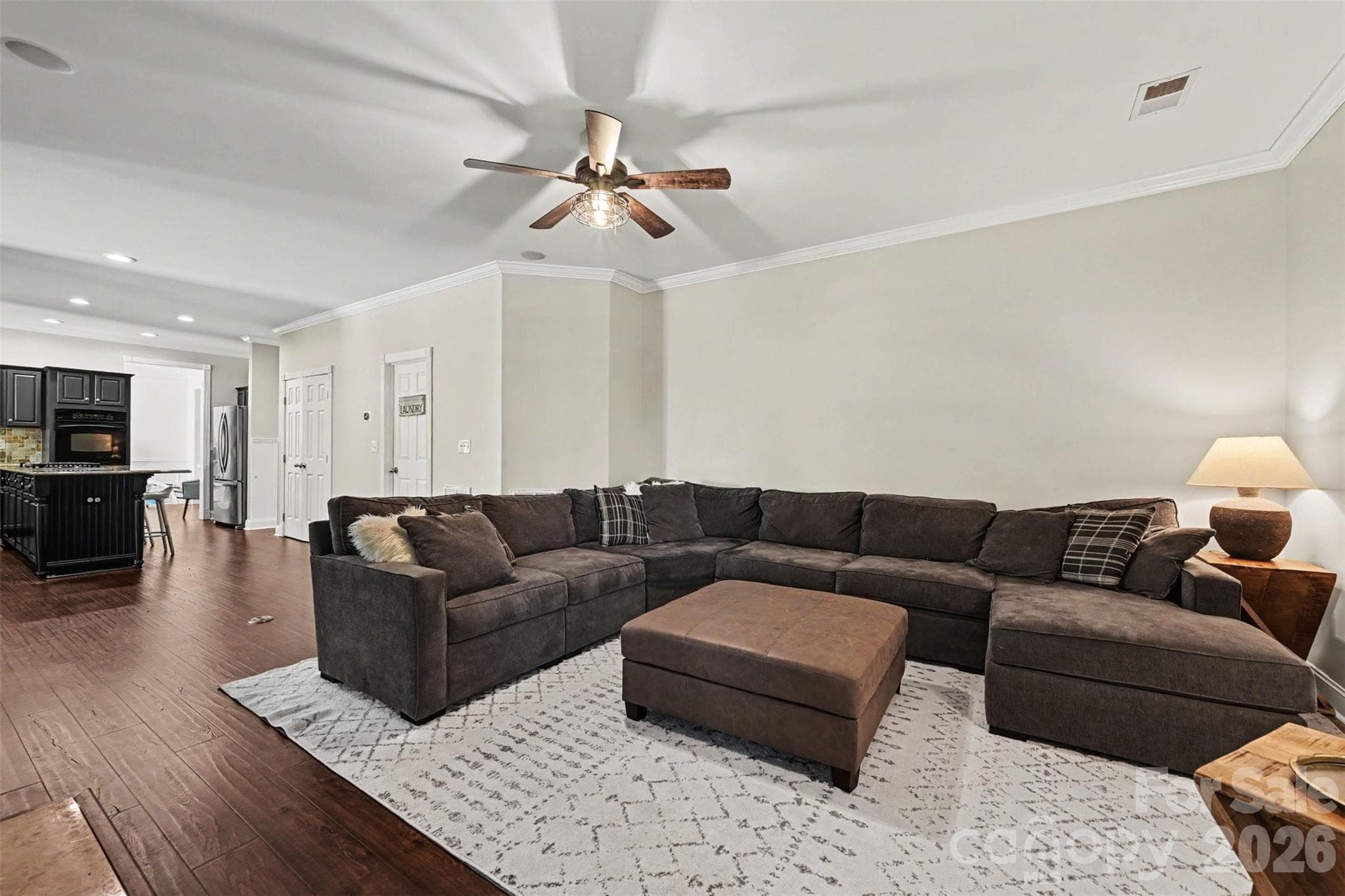 Family room off of the kitchen. Open and airy! - 2442 Smith Cove Road, Denver