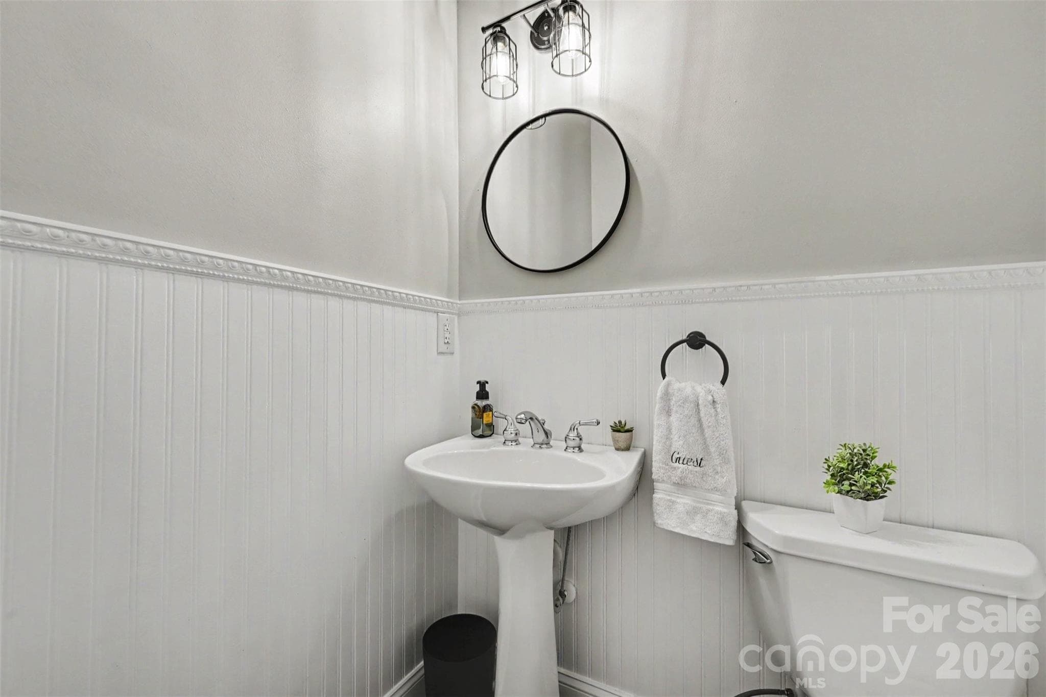 Half bath on main level. - 2442 Smith Cove Road, Denver