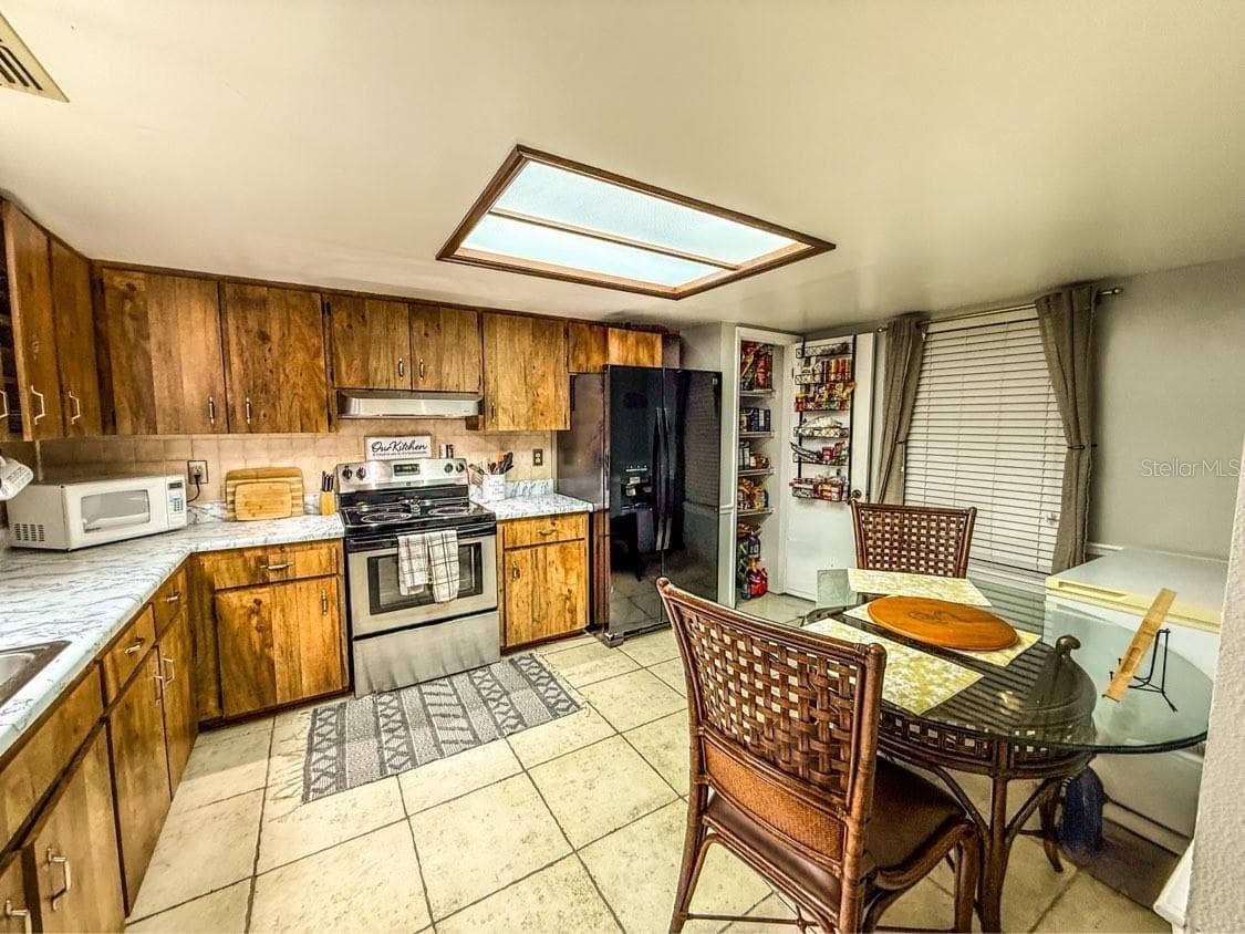 Villa at 35058 WHISPERING OAKS BLVD, DADE CITY, photo 4 of 15