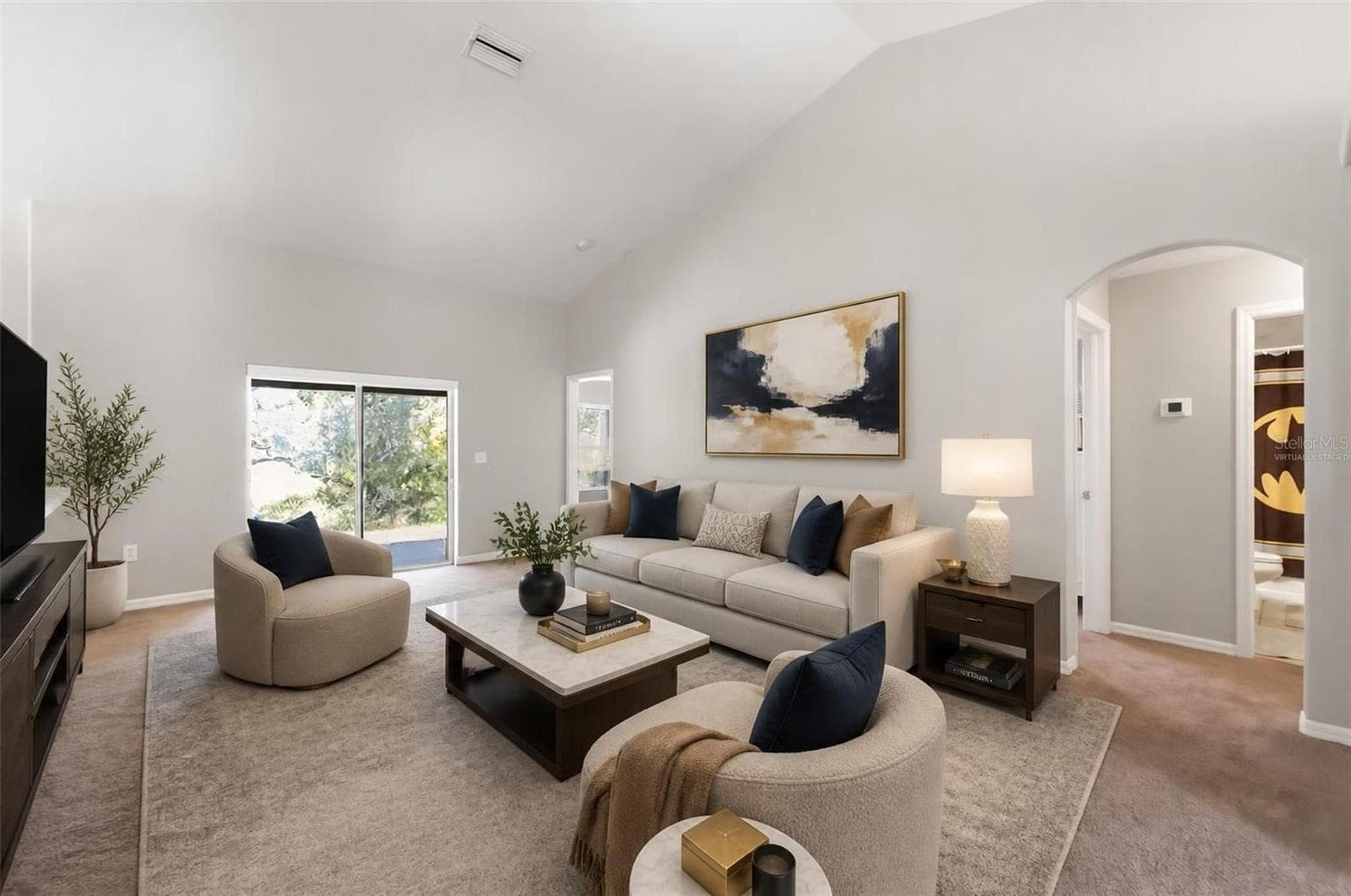 VIRTUALLY STAGEDFamily room - 12155 PEREGRINE FALCON AVE, WEEKI WACHEE