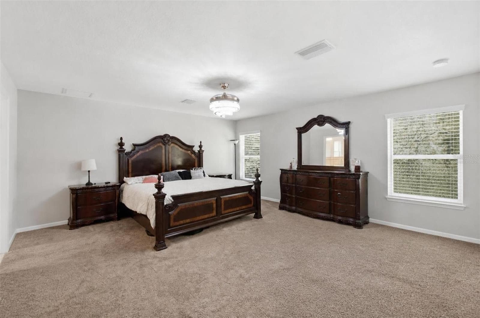 VIRTUALLY STAGEDPrimary bedroom - 12155 PEREGRINE FALCON AVE, WEEKI WACHEE