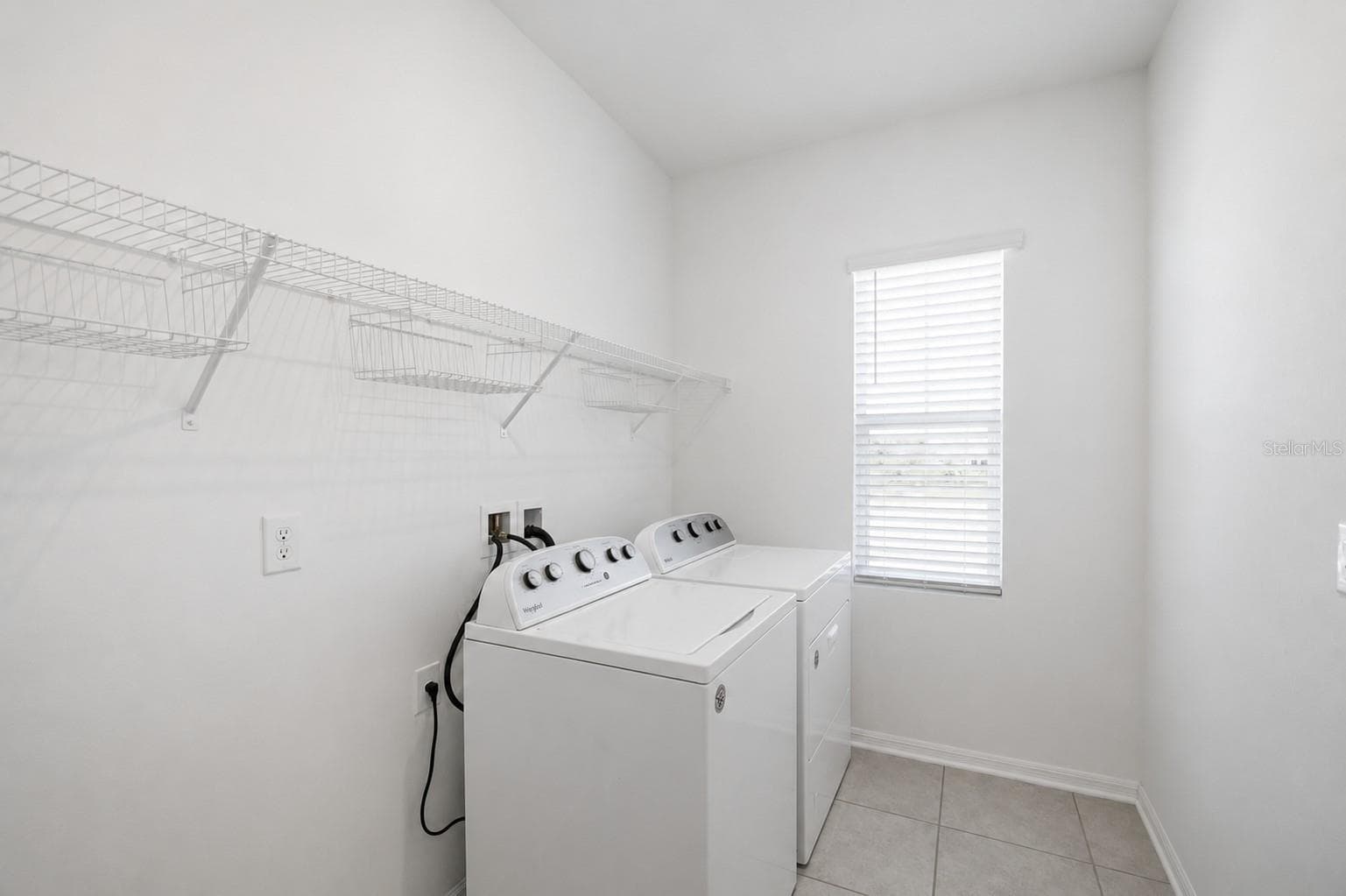 Same Floor as all Bedrooms, Large Laundry Room with Brand Name Washer/Dryer and Shelving - 5718 LOS ROBLES CT, PALMETTO