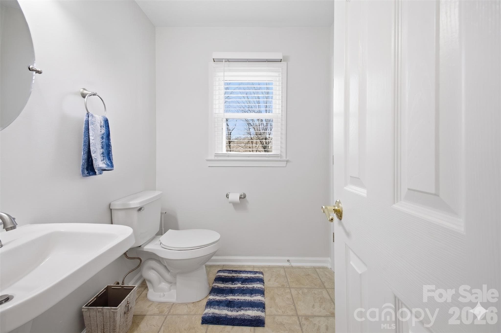 Half-bath down stairs (Popcorn ceilings digitally removed to reflect pop-corn ceiling physically being removed in home) - 109 Elk Court, Mount Holly