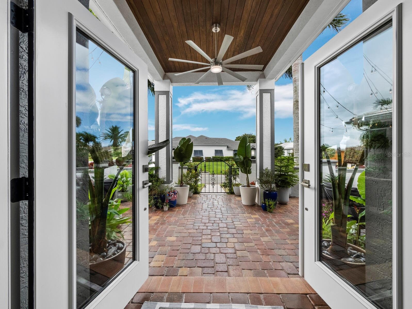 Foyer looking out to front Lanai - 206 FOUR KNOT LN, OSPREY