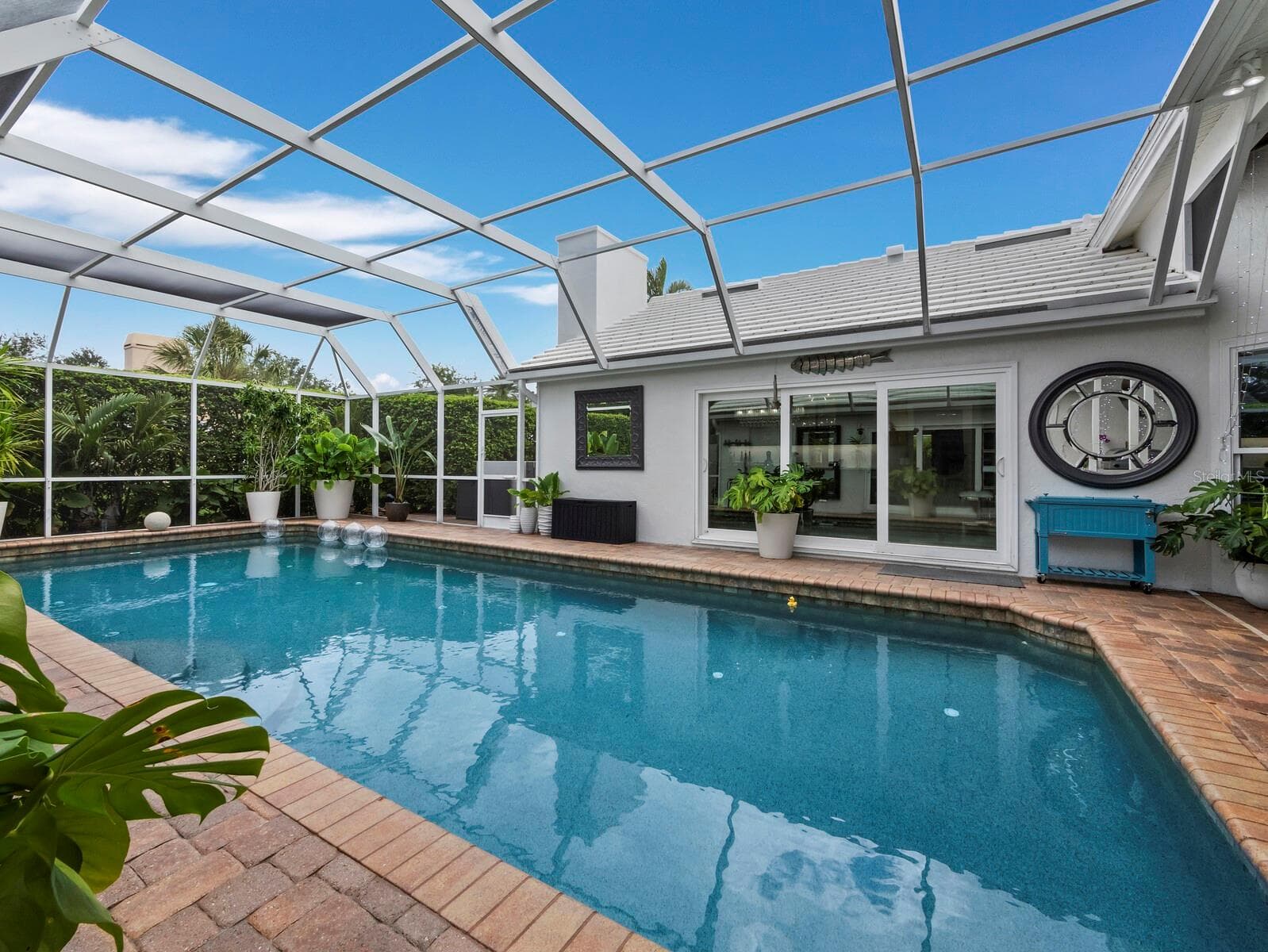 Pool view looking Bach at east wing - 206 FOUR KNOT LN, OSPREY