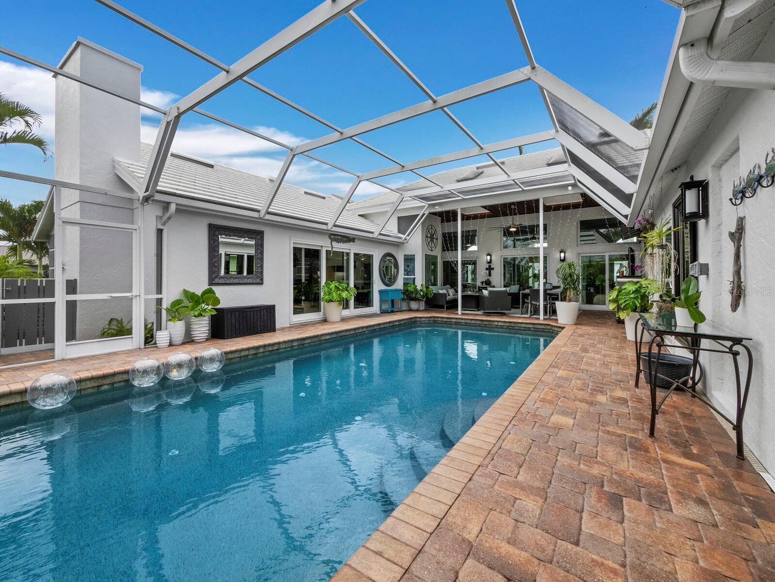 Pool view looking southeast - 206 FOUR KNOT LN, OSPREY