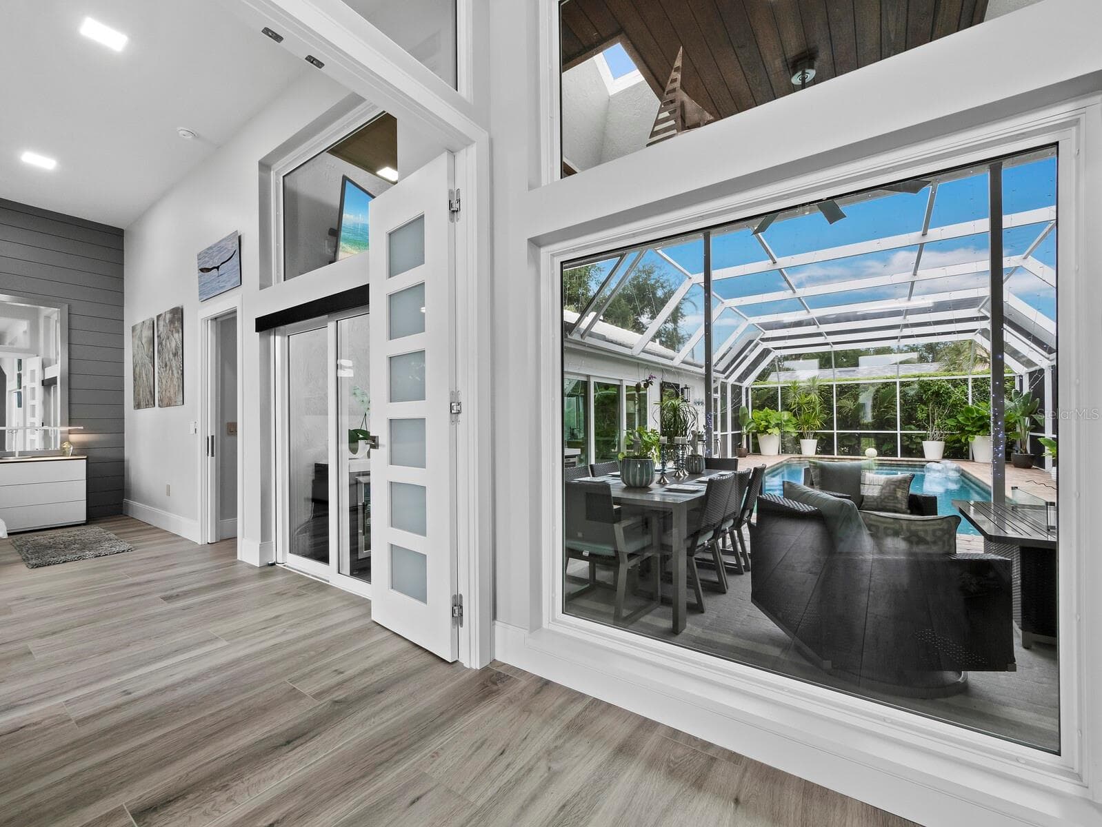 Large custom French doors leading to Primary BR - 206 FOUR KNOT LN, OSPREY