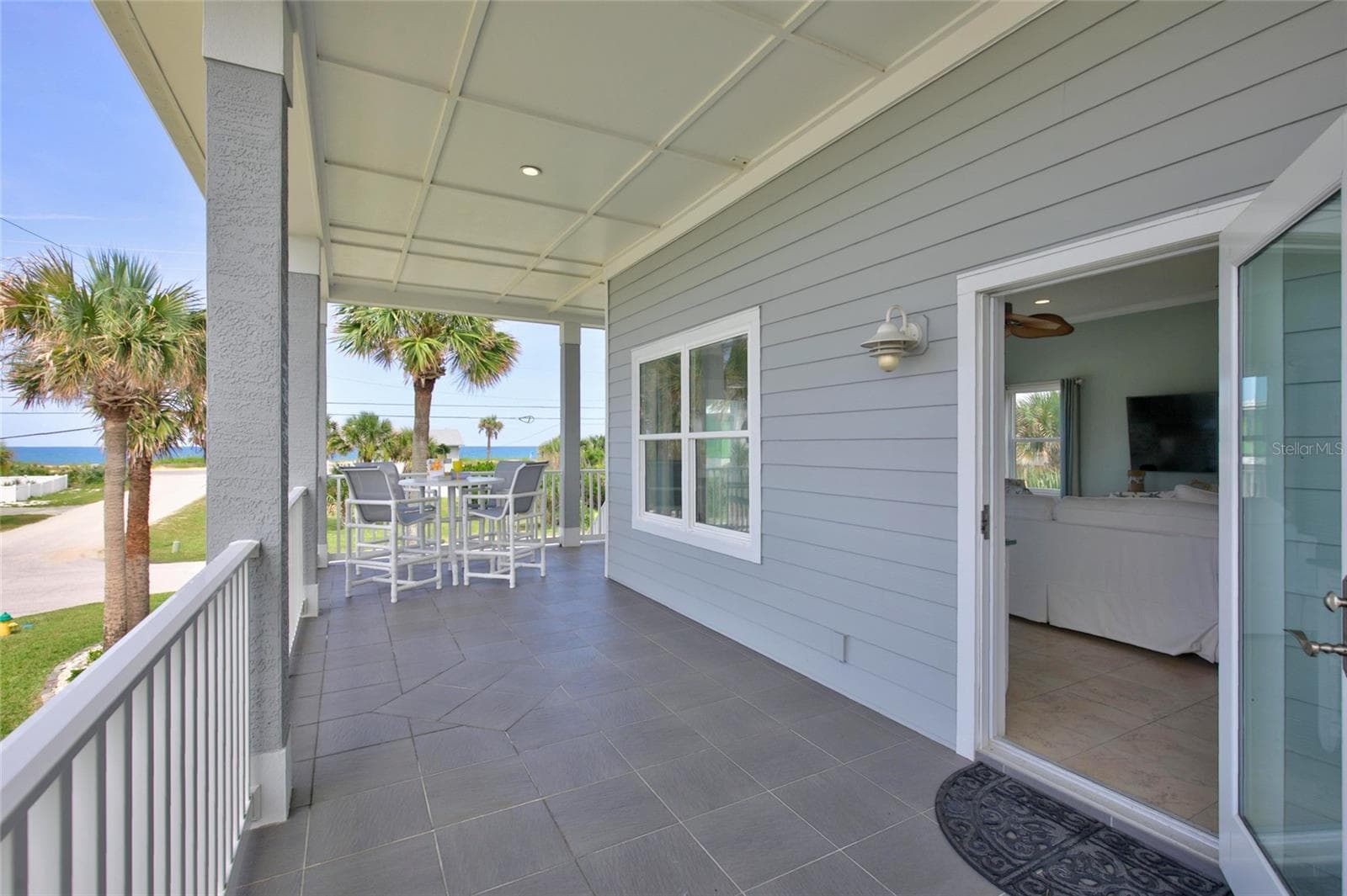 SIDE ENTRY - WRAP PORCH FLOOR 2 WITH OCEAN VIEWS - 1955 N CENTRAL AVE, FLAGLER BEACH