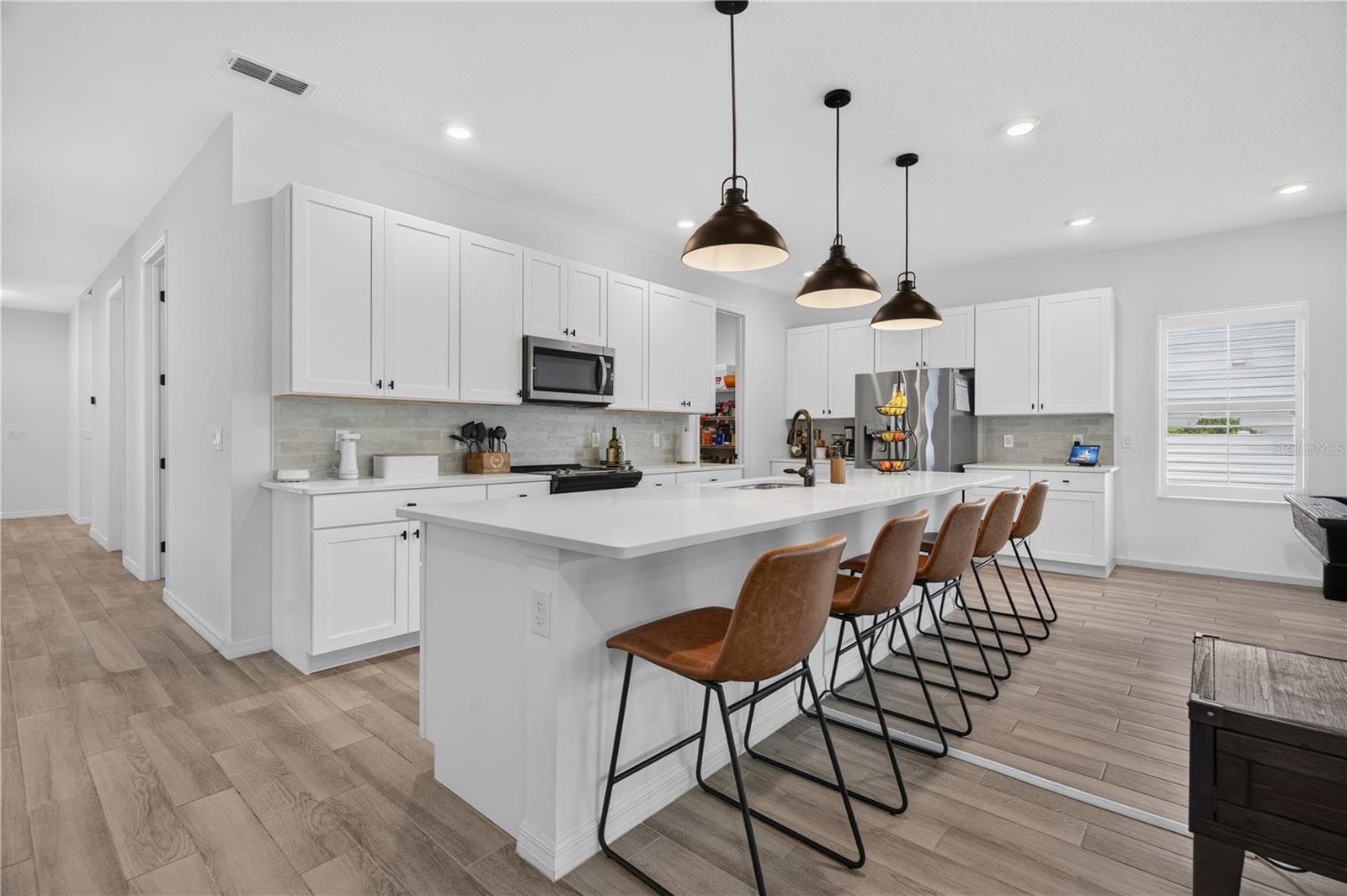 Kitchen with Quartz Countertops - 1113 PEARL TREE RD, DELTONA