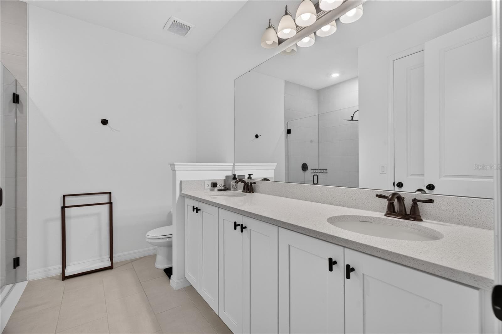 Primary Bathroom with Dual Sinks - 1113 PEARL TREE RD, DELTONA