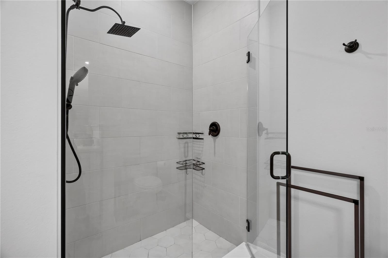 Primary Bathroom with walk-in glass shower enclosure - 1113 PEARL TREE RD, DELTONA