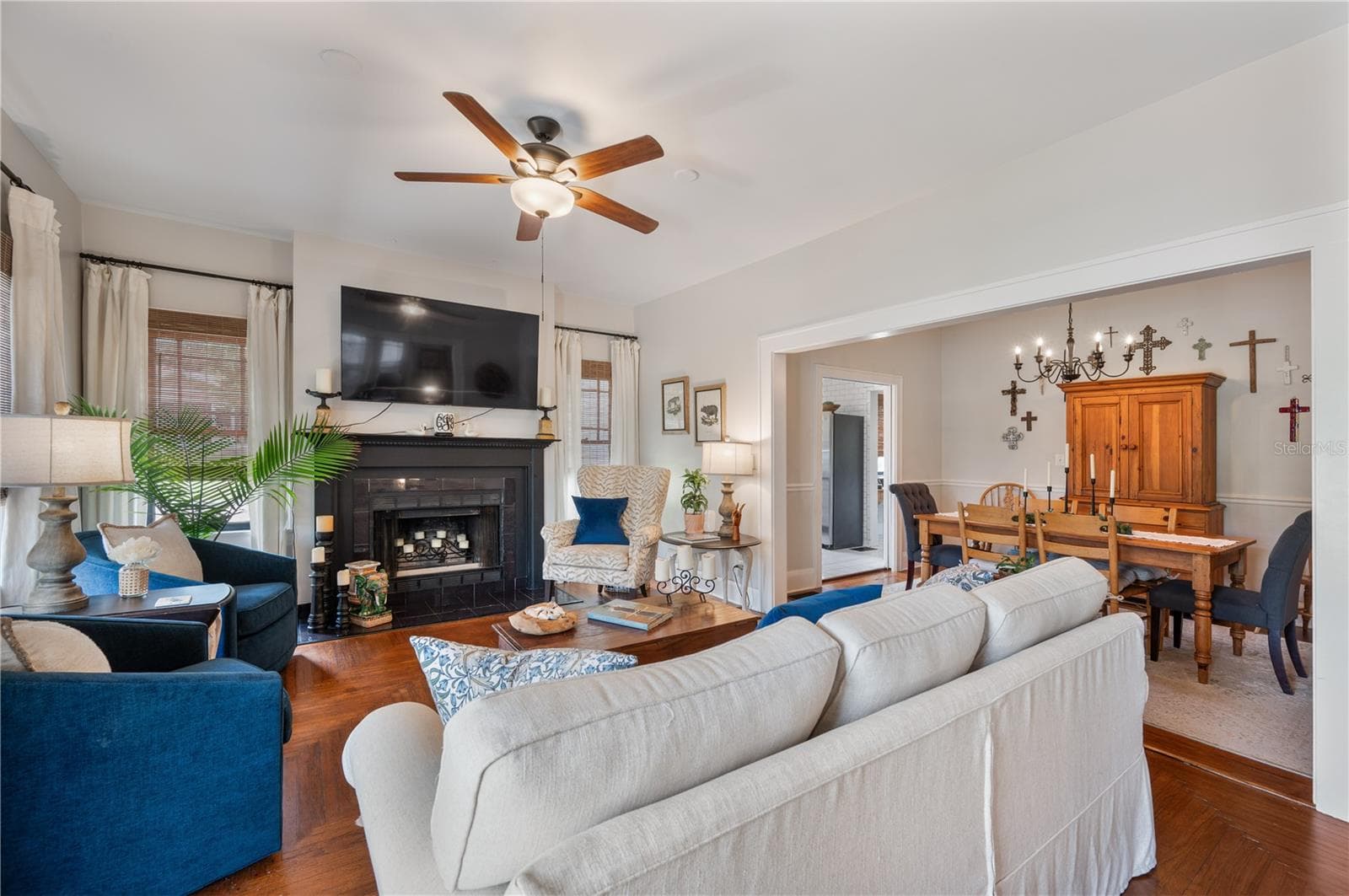 Living room with wood burning fireplace - 1102 MELTON AVE, LAKELAND