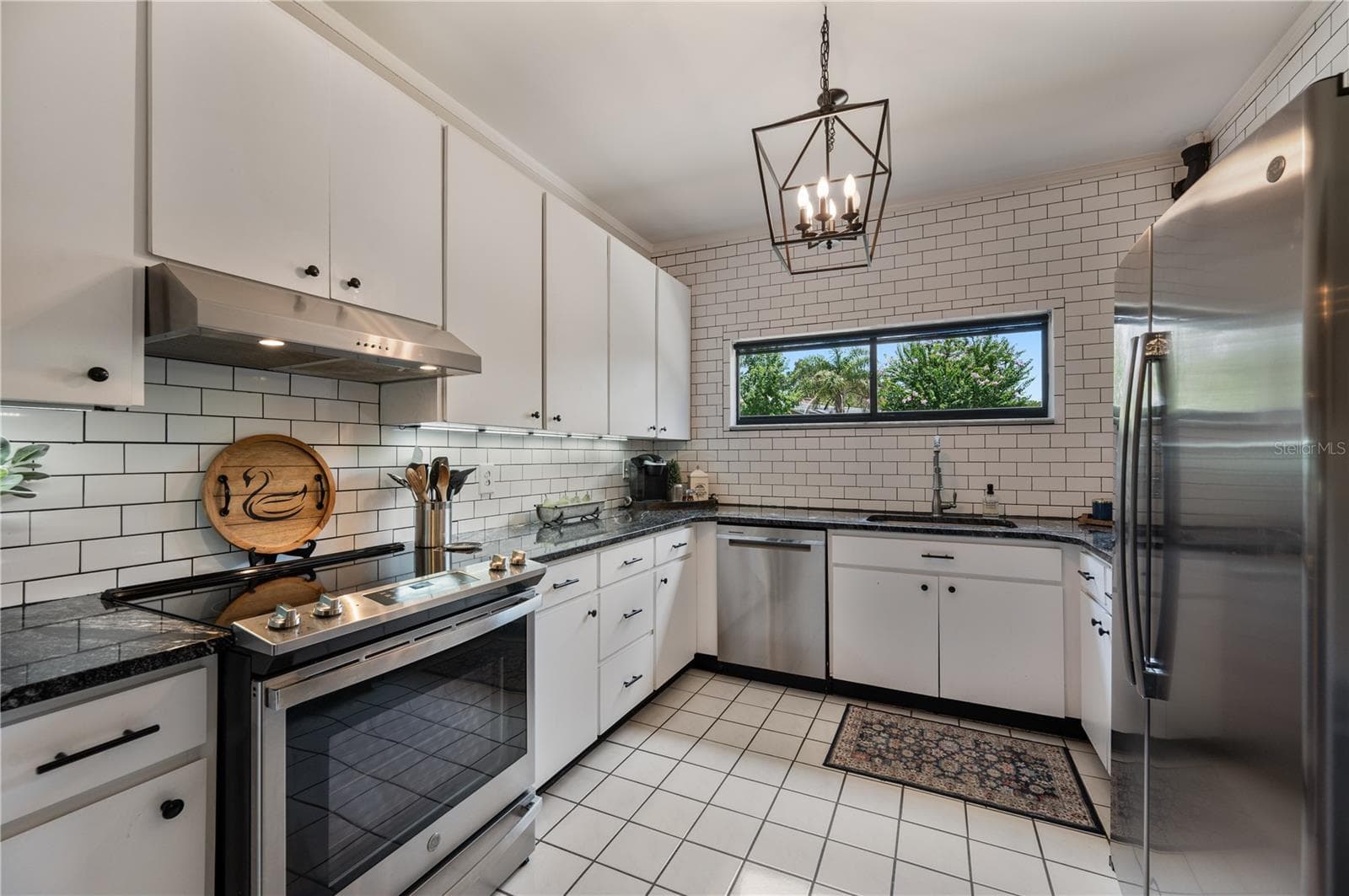 Kitchen with stainless steel appliance suite - 1102 MELTON AVE, LAKELAND