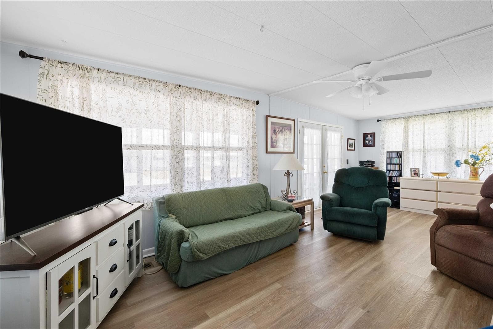 It has lots of natural light - 5301 FLINT ST, ZEPHYRHILLS
