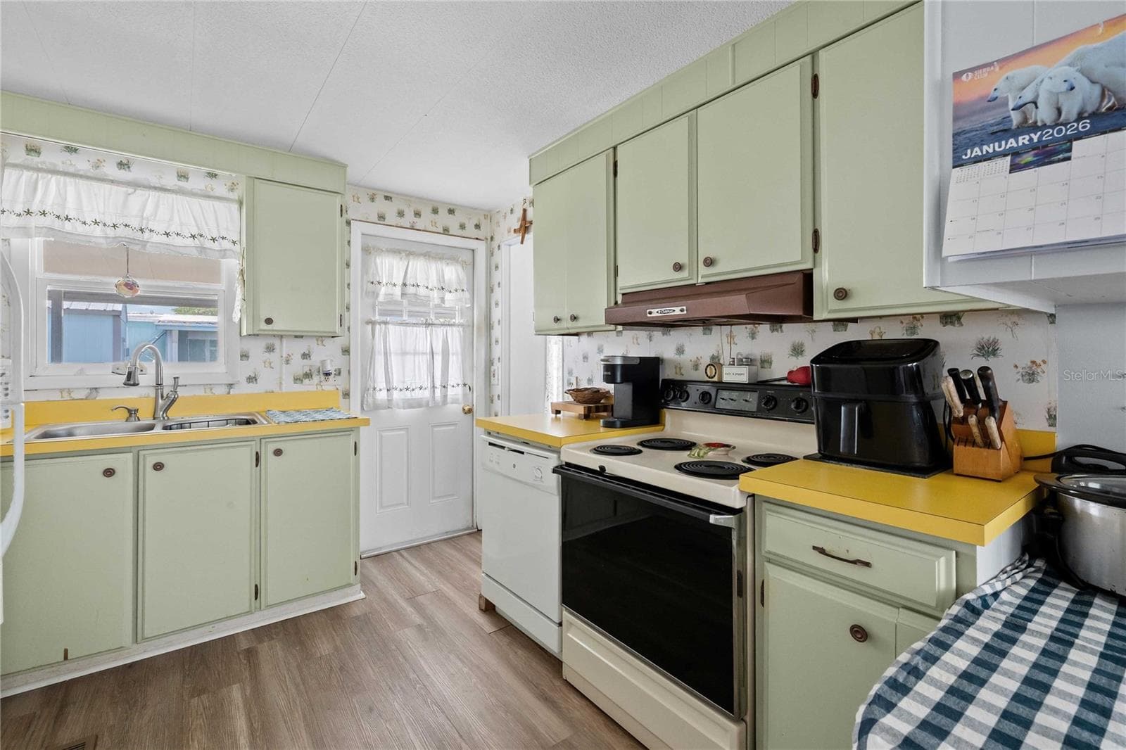 This kitchen is of ample size - 5301 FLINT ST, ZEPHYRHILLS