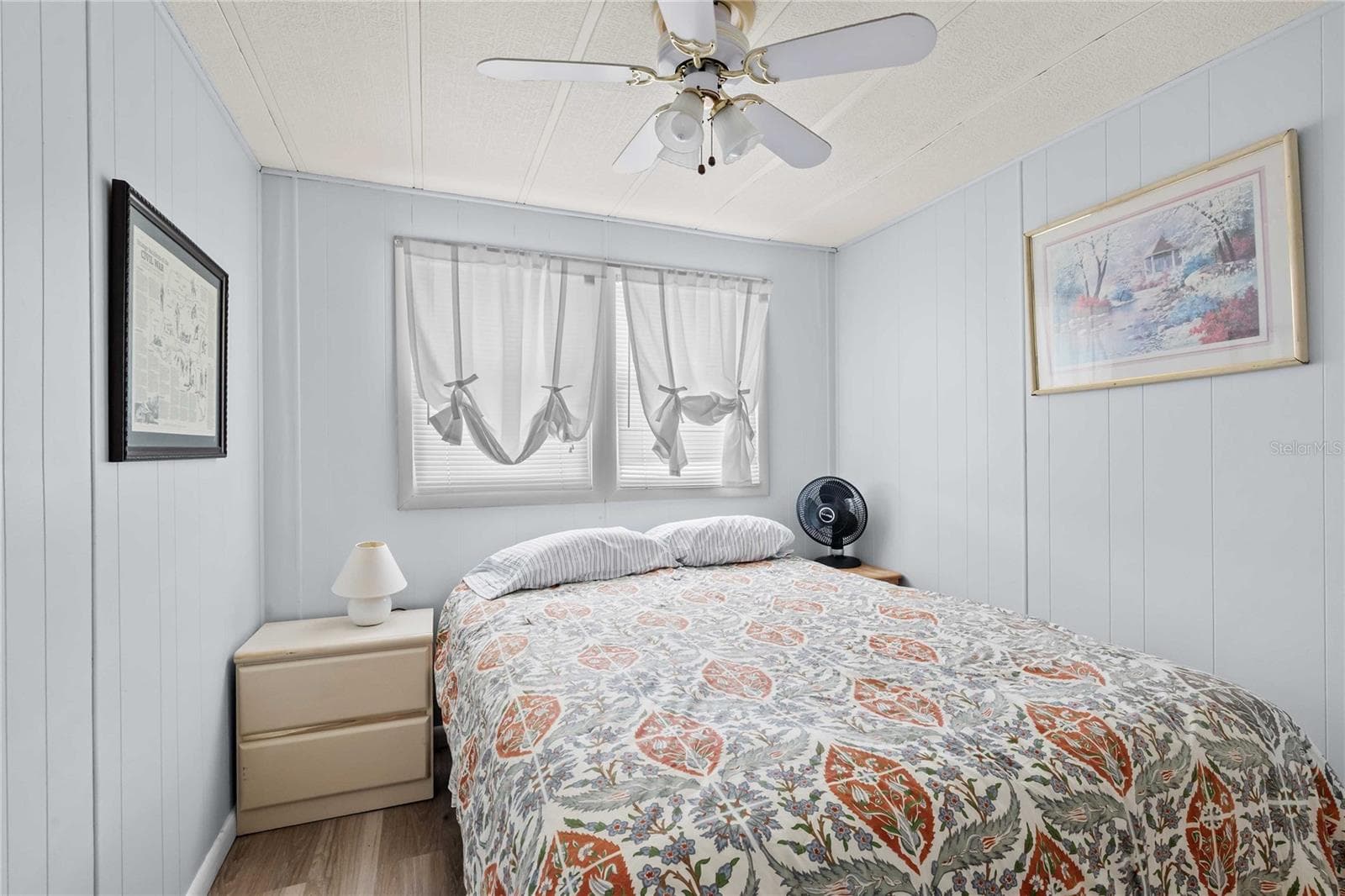 The guest bedroom is bright and welcoming - 5301 FLINT ST, ZEPHYRHILLS