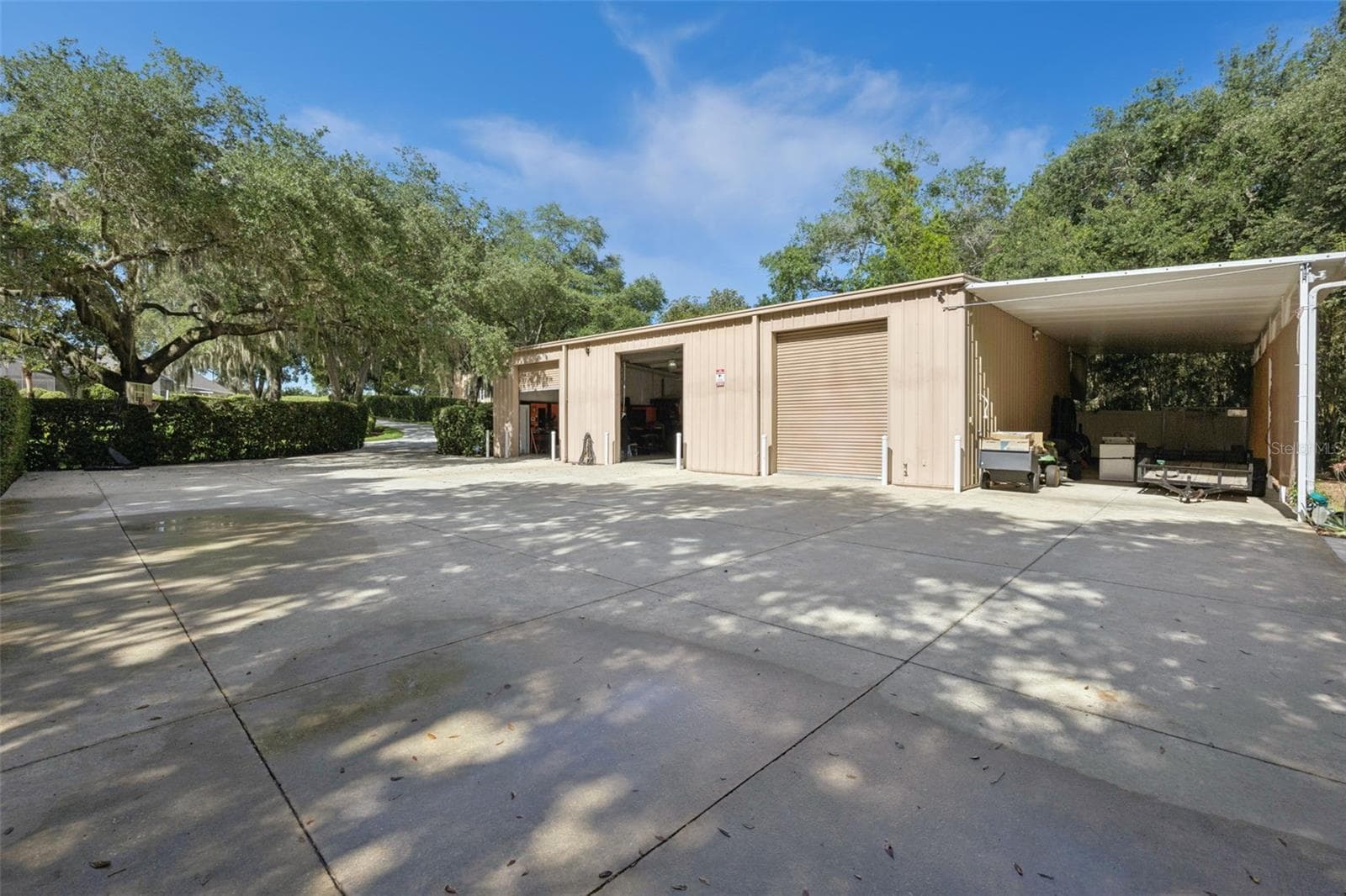 2400 SF Insulated RV/Boat/Collector Garage & Workshop + 784 SF Covered RV/Boat Carport - 605 OLD MOUNT DORA RD, EUSTIS