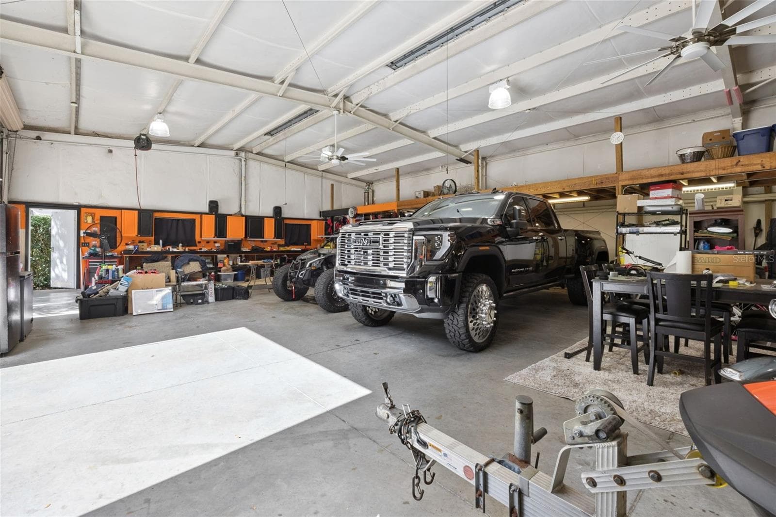 Detached garage with extensive storage, workshop areas - 605 OLD MOUNT DORA RD, EUSTIS