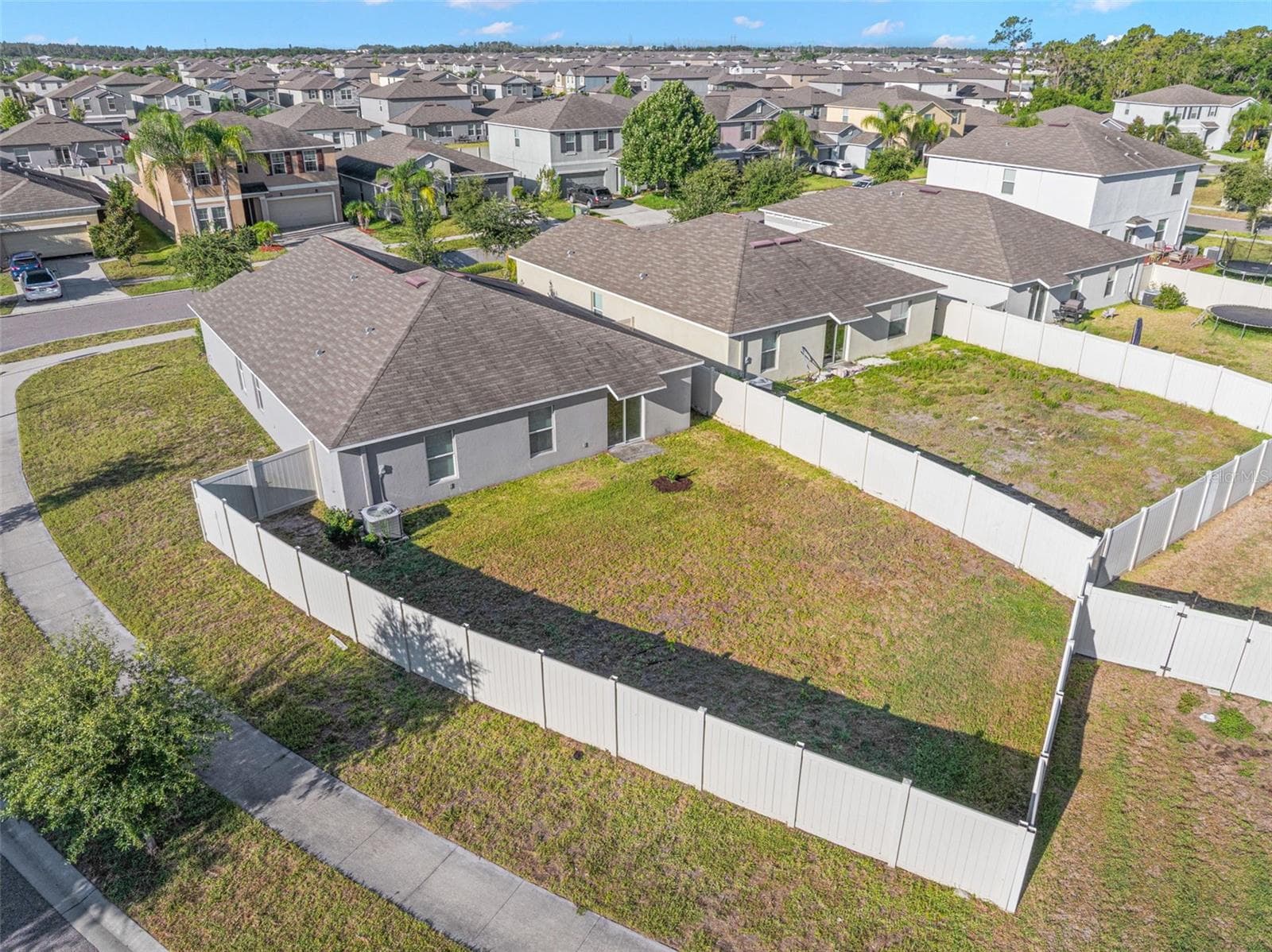 Built in 2019, Spacious corner-lot living with a fully fenced backyard—offering room for pets, play, gardening, and outdoor entertaining. - 6810 TRENT CREEK DR, SUN CITY CENTER