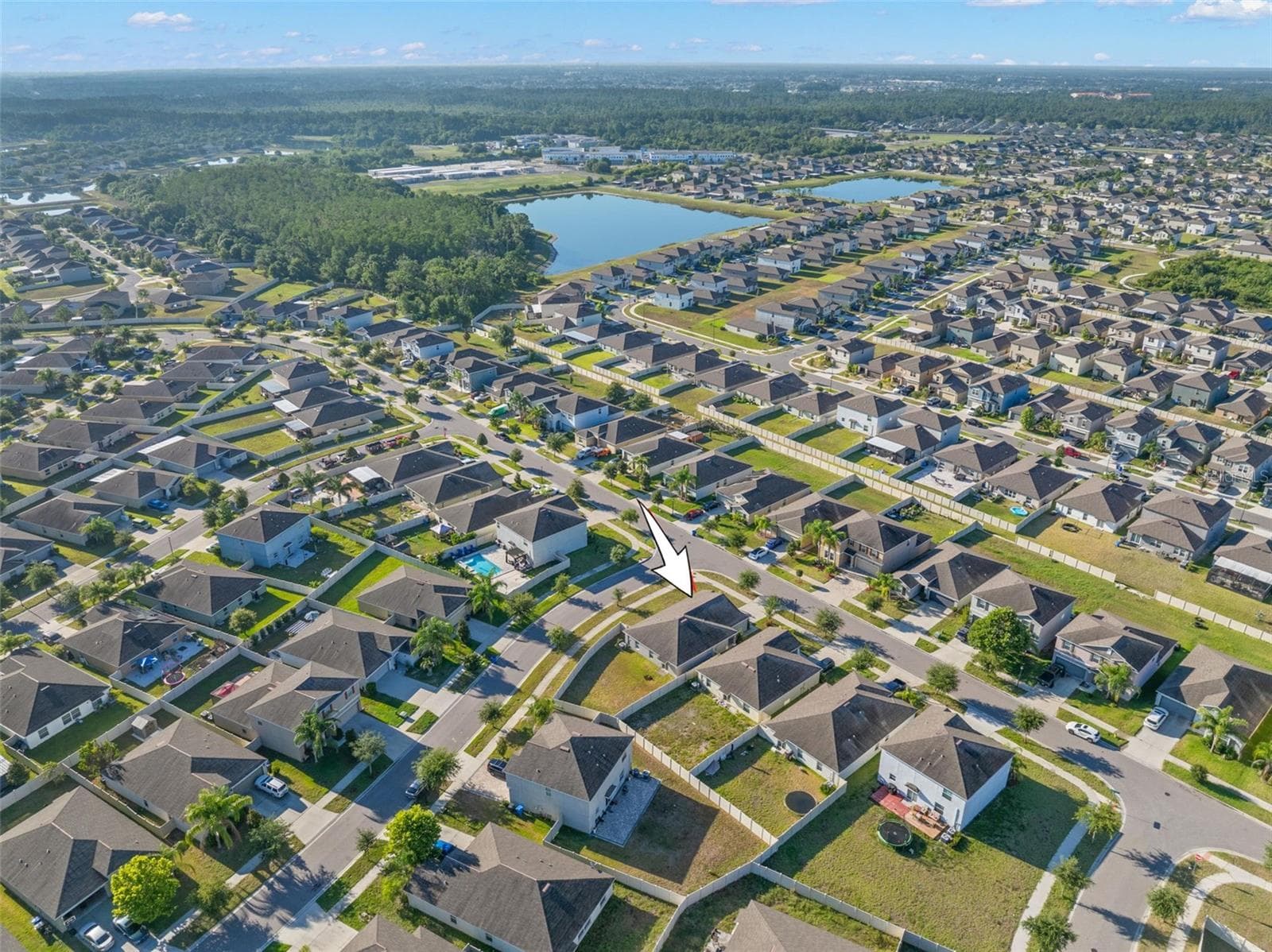 A desirable corner-lot setting with sidewalks, decorative street lighting, and a welcoming neighborhood streetscape. - 6810 TRENT CREEK DR, SUN CITY CENTER