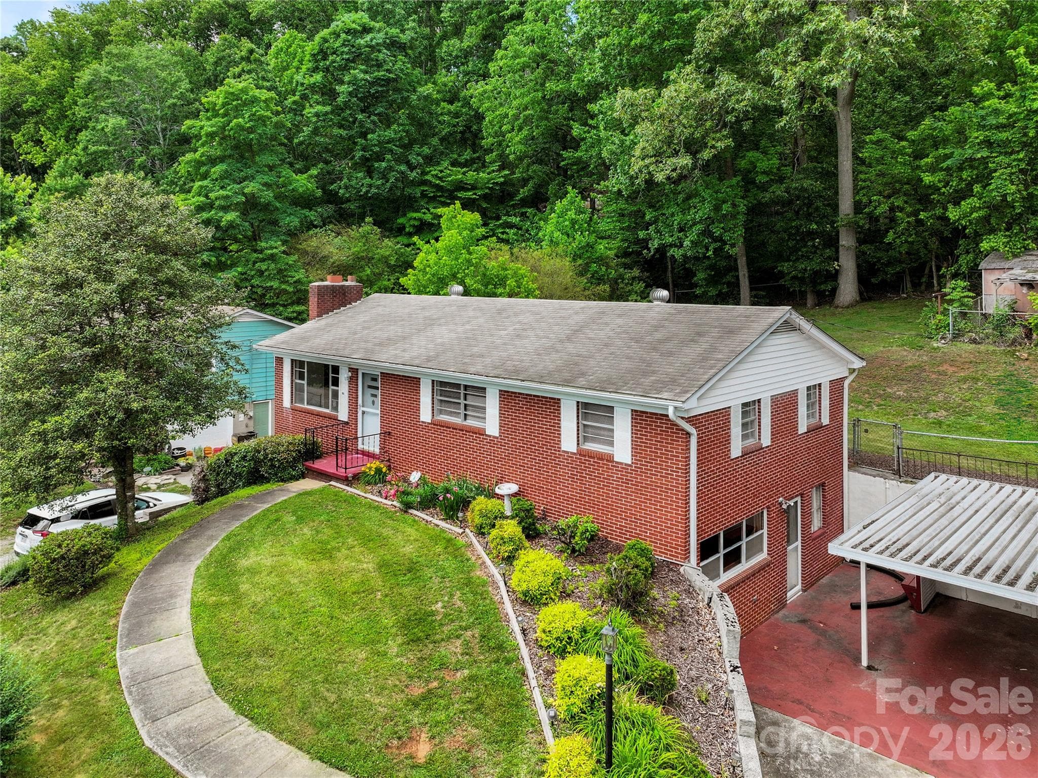 Single Family Residence at 309 Oak Hill Road, Candler, photo 4 of 41