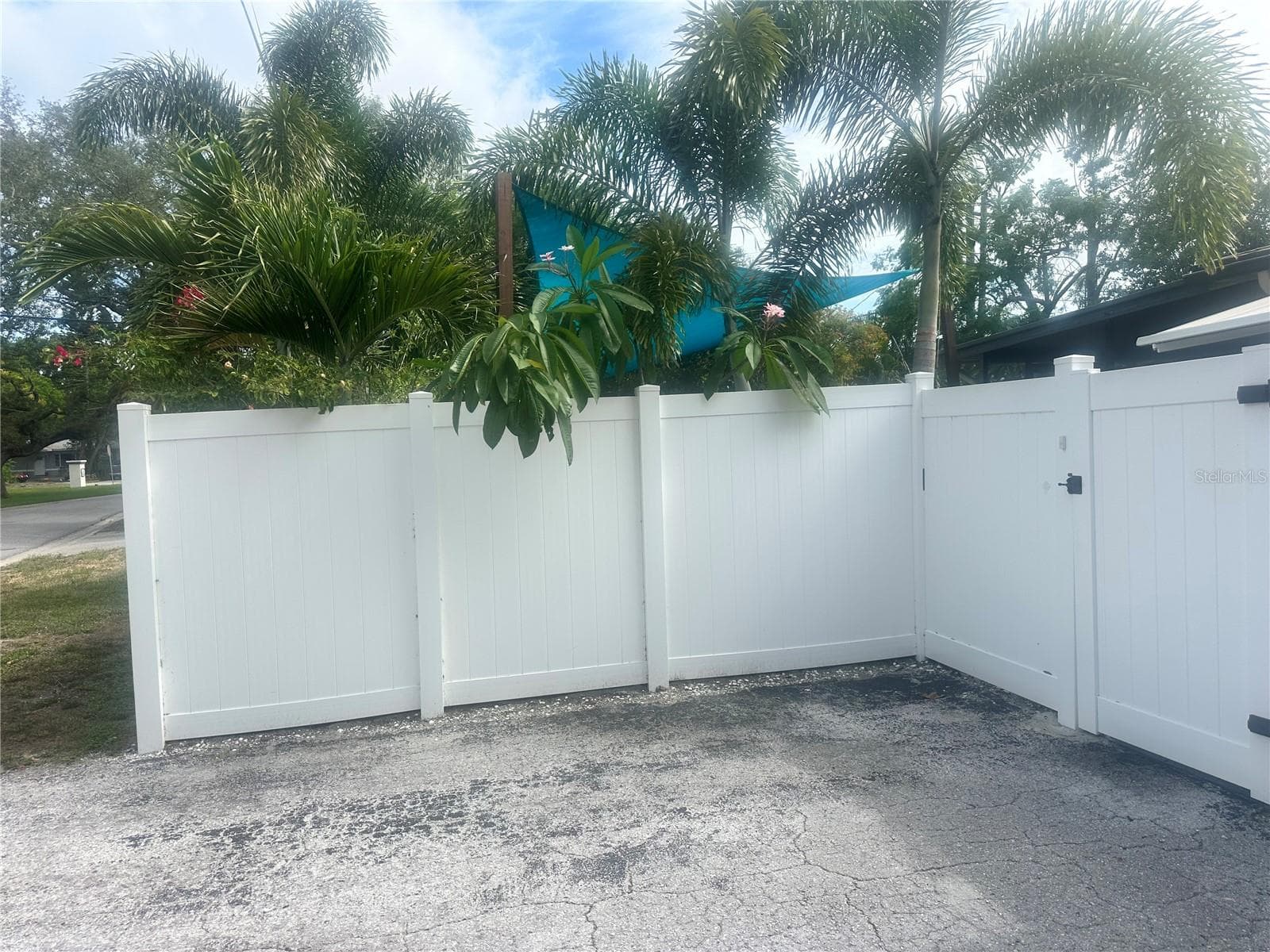 Parking pad for two vehicles on side of home. - 4600 30TH AVE N, ST PETERSBURG