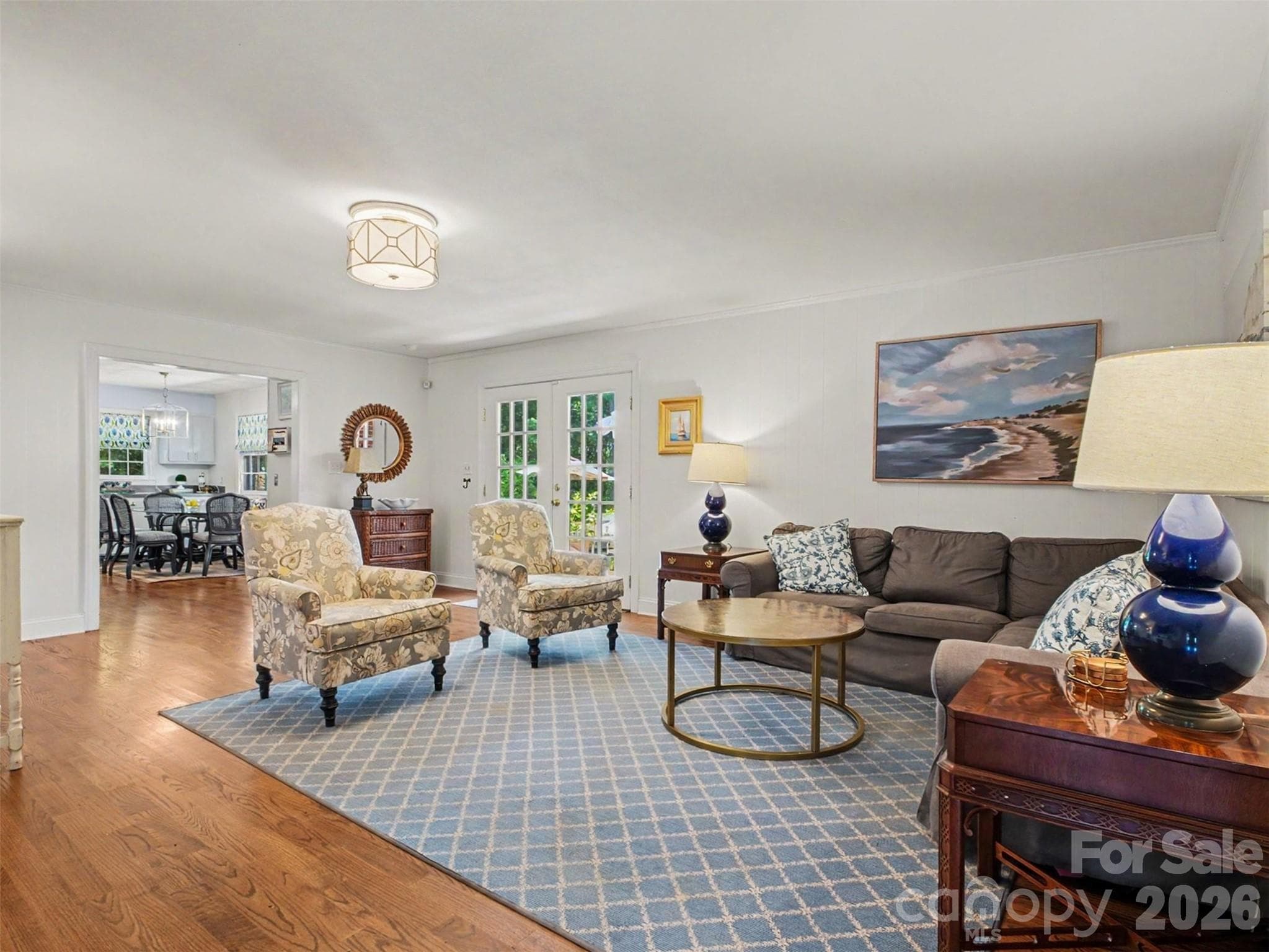 Cook, chat, and never miss a moment, the kitchen flows right into family room - 441 Claymont Street SE, Concord
