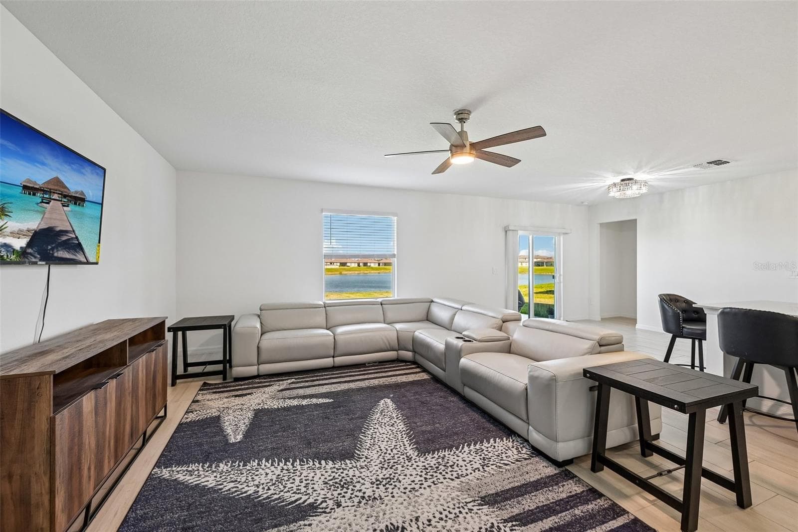 Living Room with Lake View - 8807 SUNSET PARK TRL, PARRISH