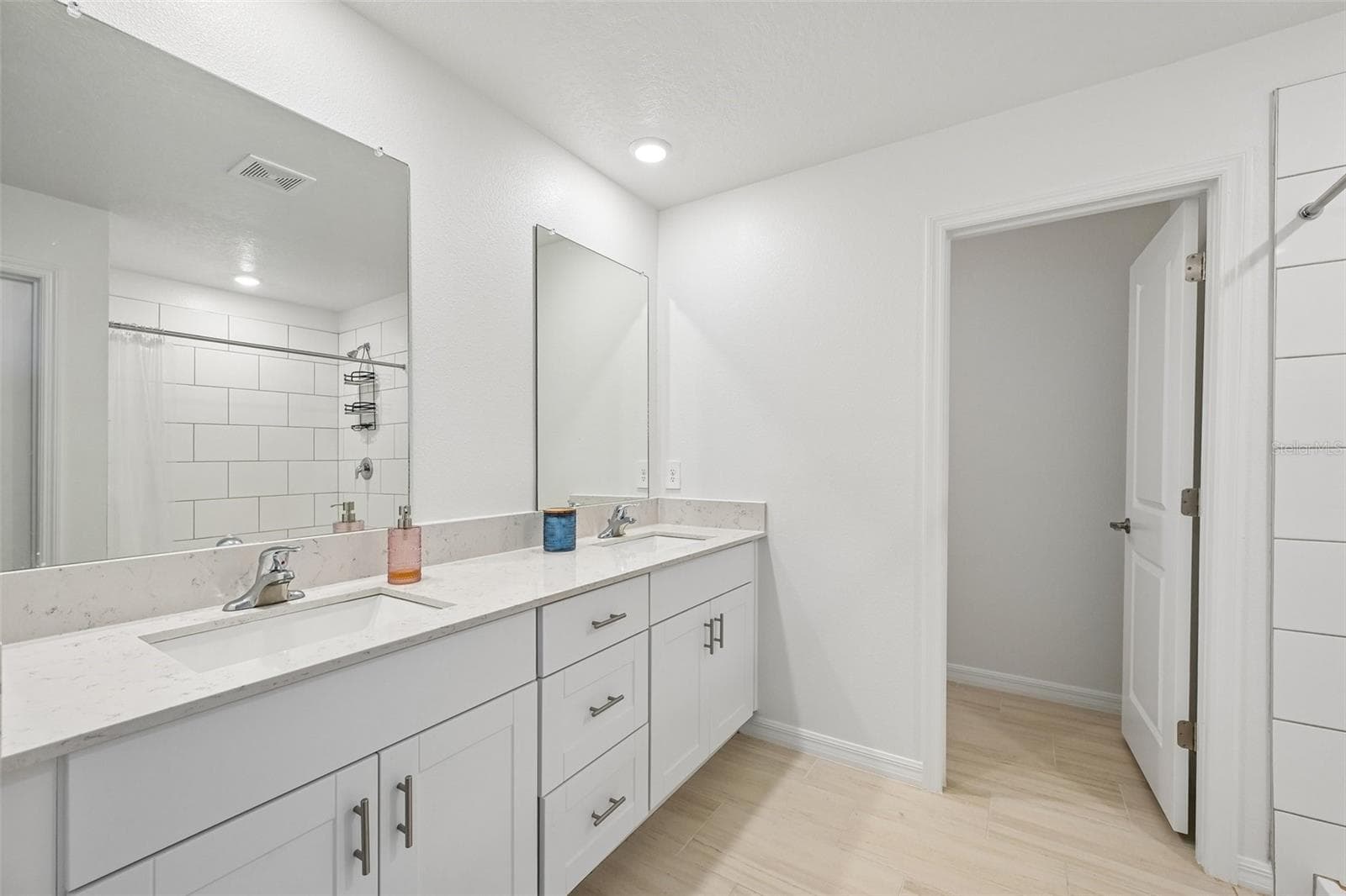 Primary Bath with Privacy Door - 8807 SUNSET PARK TRL, PARRISH