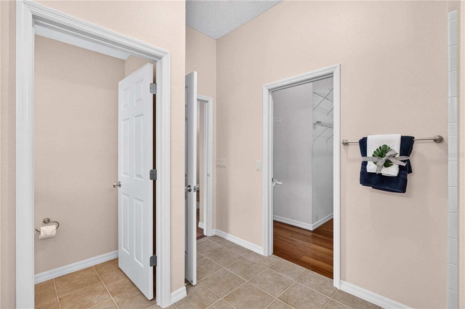 Primary bath area with separate shower, private water closet, and convenient access to the bedroom and closet spaces. - 16815 SE 85TH BELKNAP AVE, THE VILLAGES