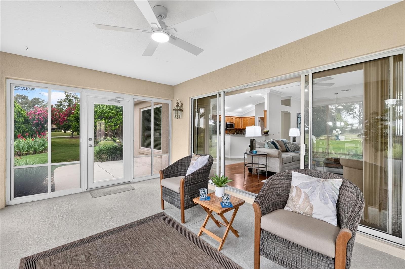 Inviting lanai with access to the main living area and backyard, creating a seamless space for everyday enjoyment. - 16815 SE 85TH BELKNAP AVE, THE VILLAGES