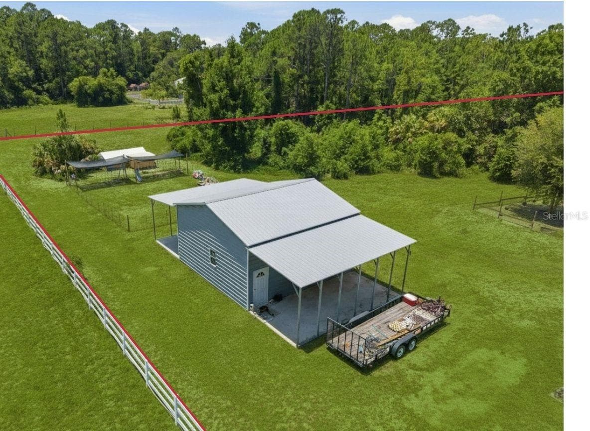 Garage and back of property - 7242 BLACK RD, LAKE WALES
