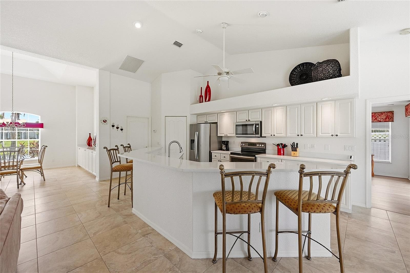 Open Kitchen With Updated Floor - 816 BOUNDARY BLVD, ROTONDA WEST
