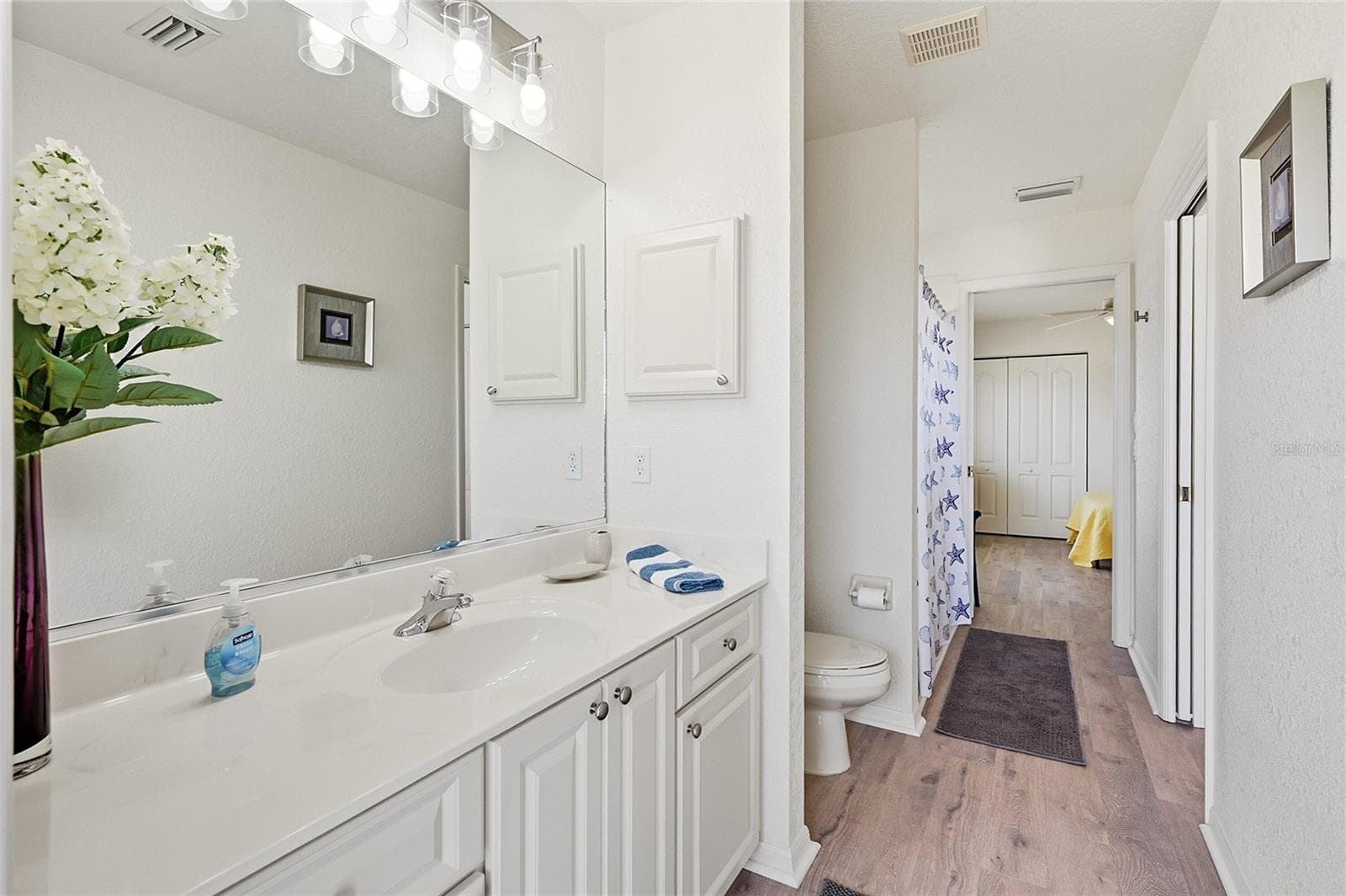 Jack and Jill Bath has accessfrm BRs 3 and 4 along with the Pool Area - 816 BOUNDARY BLVD, ROTONDA WEST