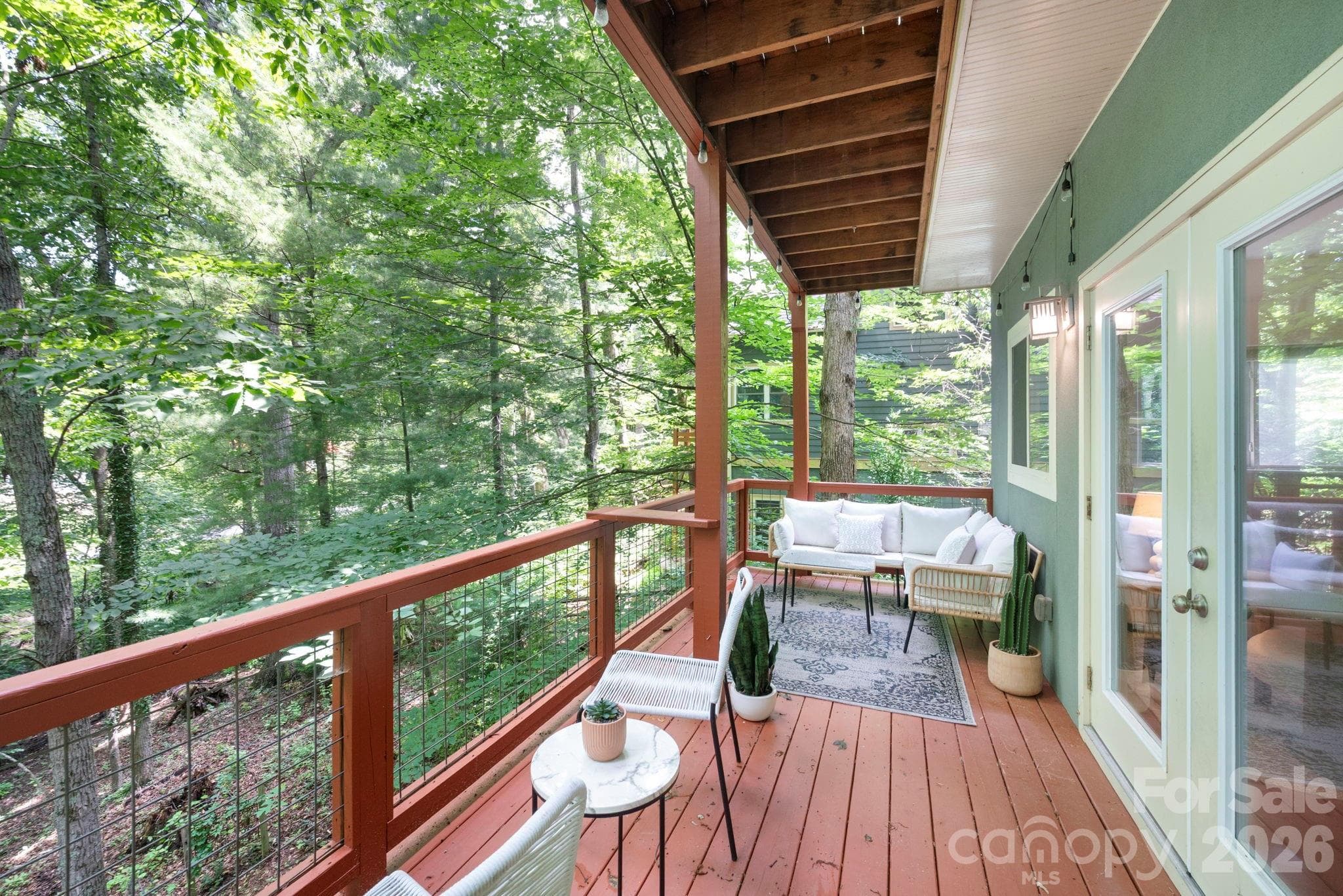 Enjoy morning coffee on the main level deck - Asheville