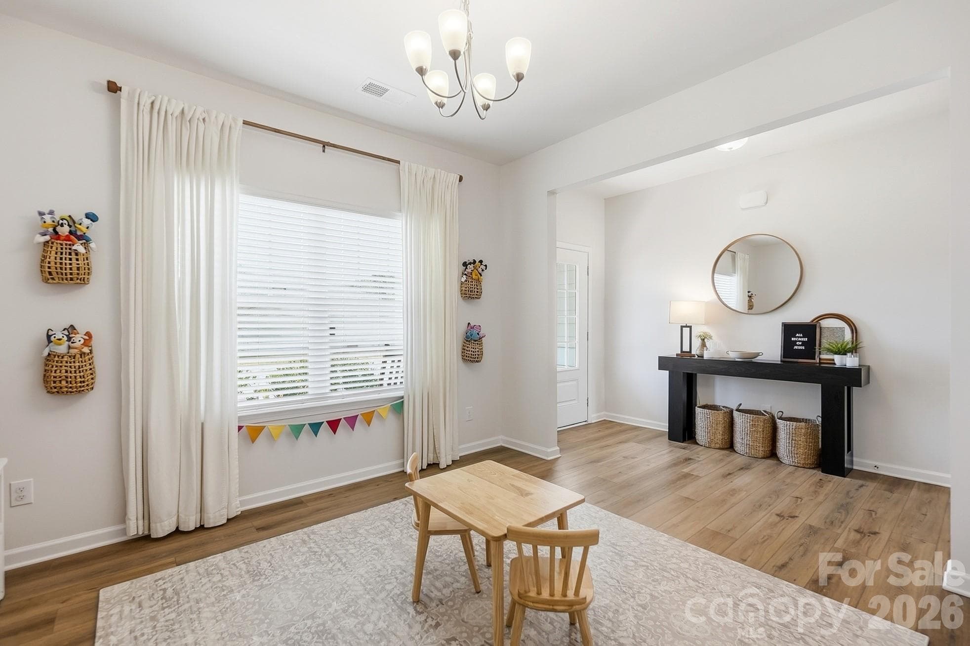 Versatile front flex room- perfect for an office, playroom, or dining space. - 6023 Busch Way, Midland