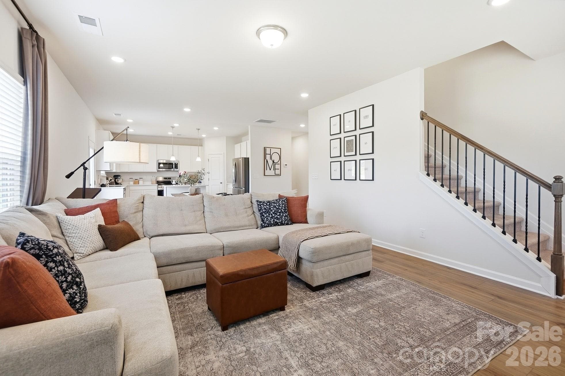 Spacious open layout connects the kitchen, dining area, and family room. - 6023 Busch Way, Midland