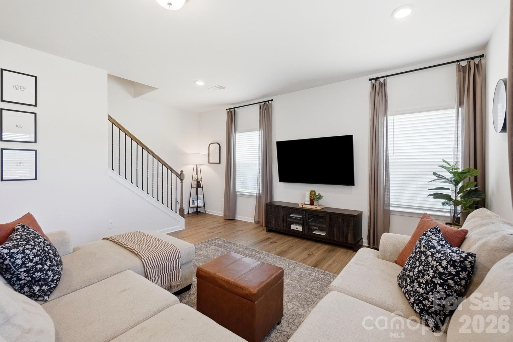 Comfortable family room with space for multiple seating arrangements. - 6023 Busch Way, Midland