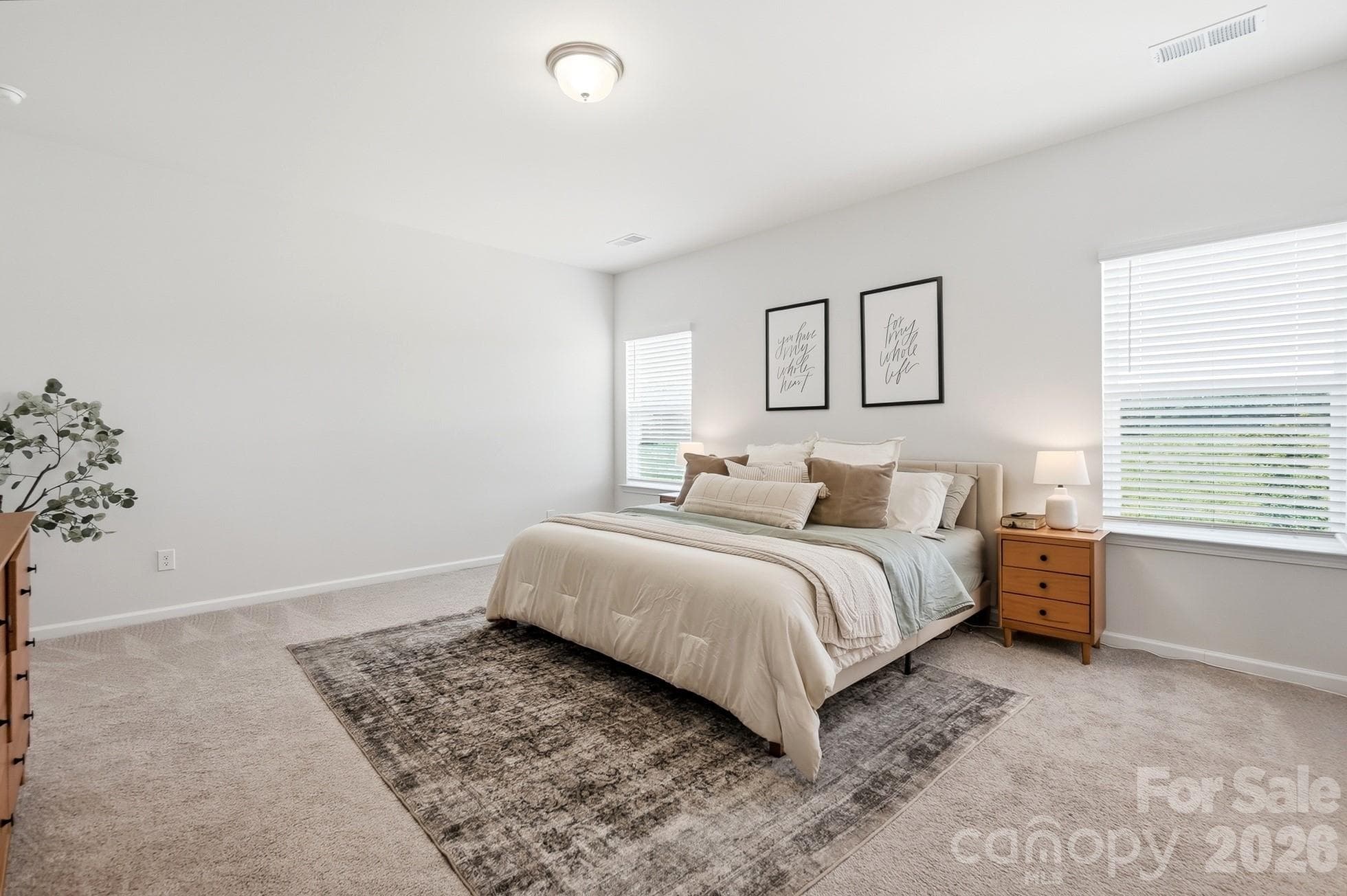 Large primary bedroom with room for a king-size furniture arrangement. - 6023 Busch Way, Midland