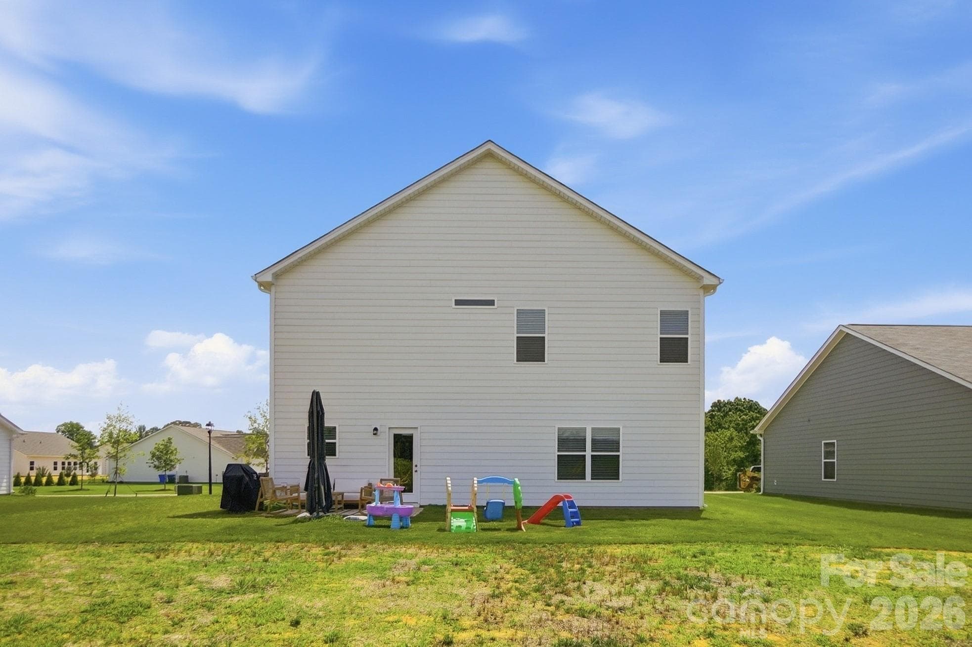 Spacious backyard ready for play, pets, gardening, or outdoor entertaining. - 6023 Busch Way, Midland