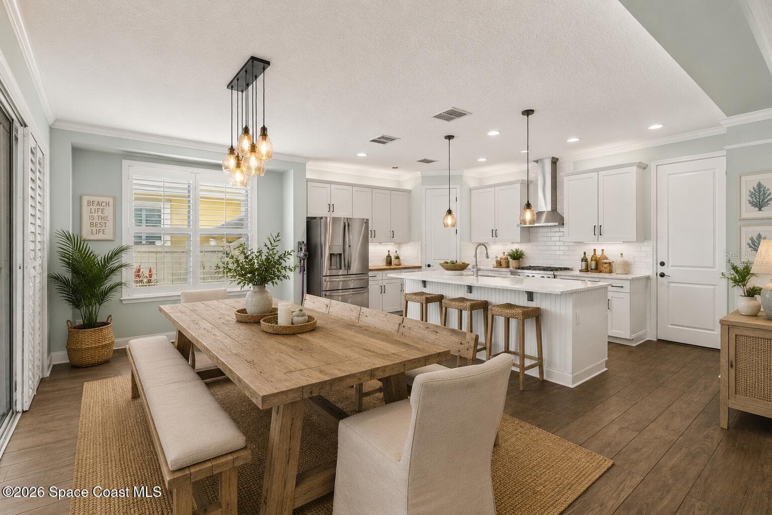 Virtually Staged Kitchen And Dining Are - 10651 LANGEFIELD ST, ORLANDO