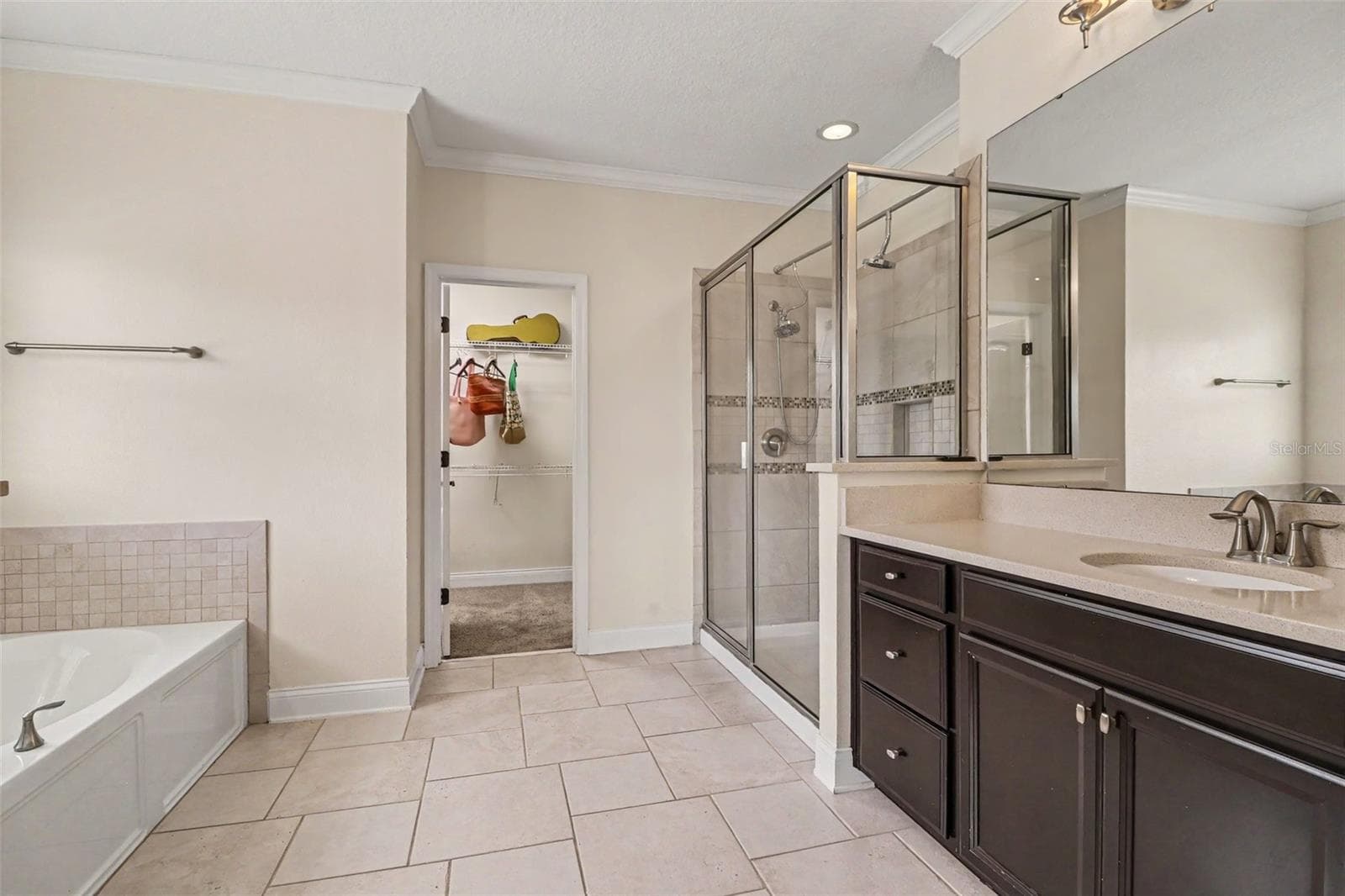 Primary Bath with Walk-in Closet - 10651 LANGEFIELD ST, ORLANDO
