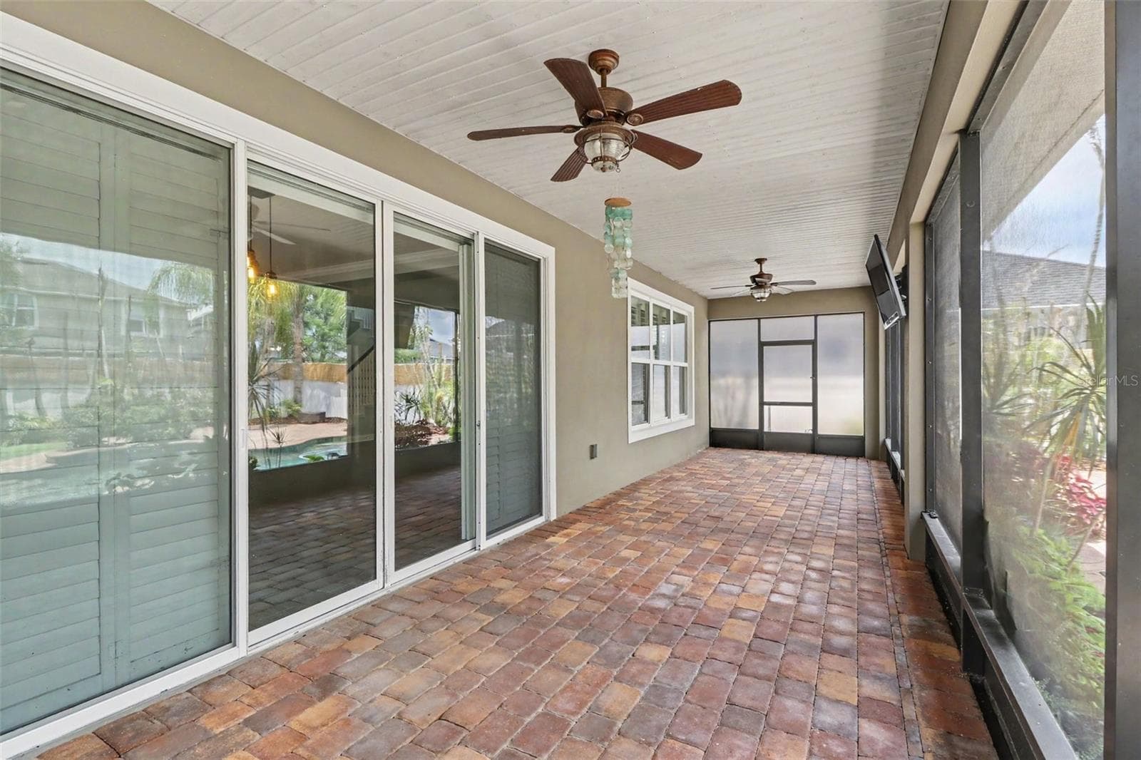 Rear Screened Patio - 10651 LANGEFIELD ST, ORLANDO