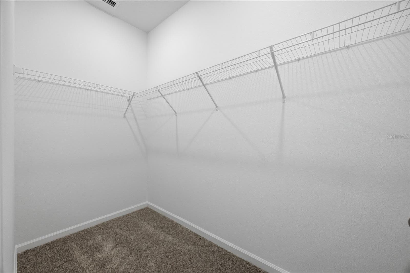 Primary Closet - 6205 SANDERS GROVE CIR, OKAHUMPKA