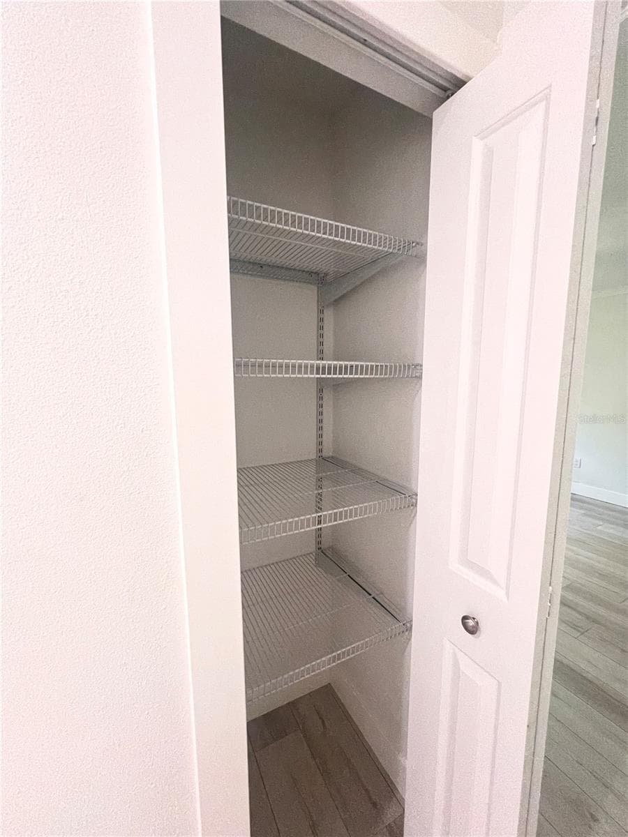 Hallway closet - 4044 CORKWOOD CT, PALM HARBOR