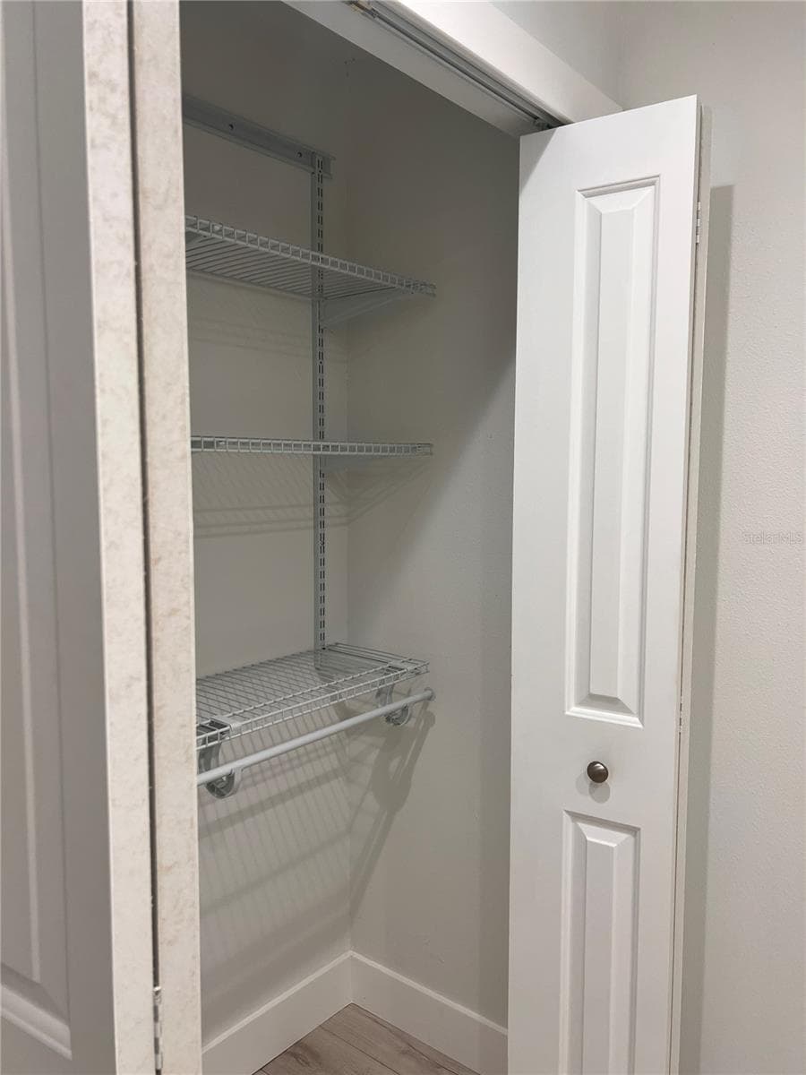 Bathroom closet - 4044 CORKWOOD CT, PALM HARBOR