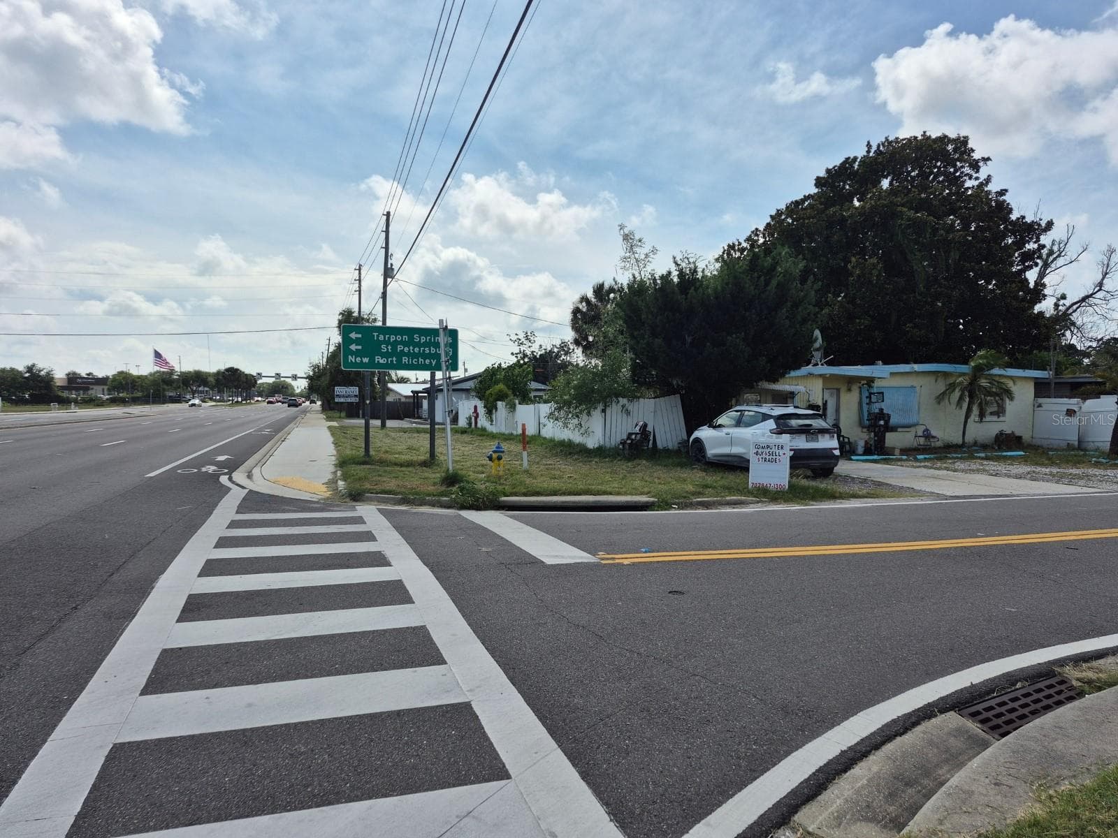 Looking West on SR54 from Flamingo Drive toward the property. - 4007 FLAMINGO DR, NEW PORT RICHEY