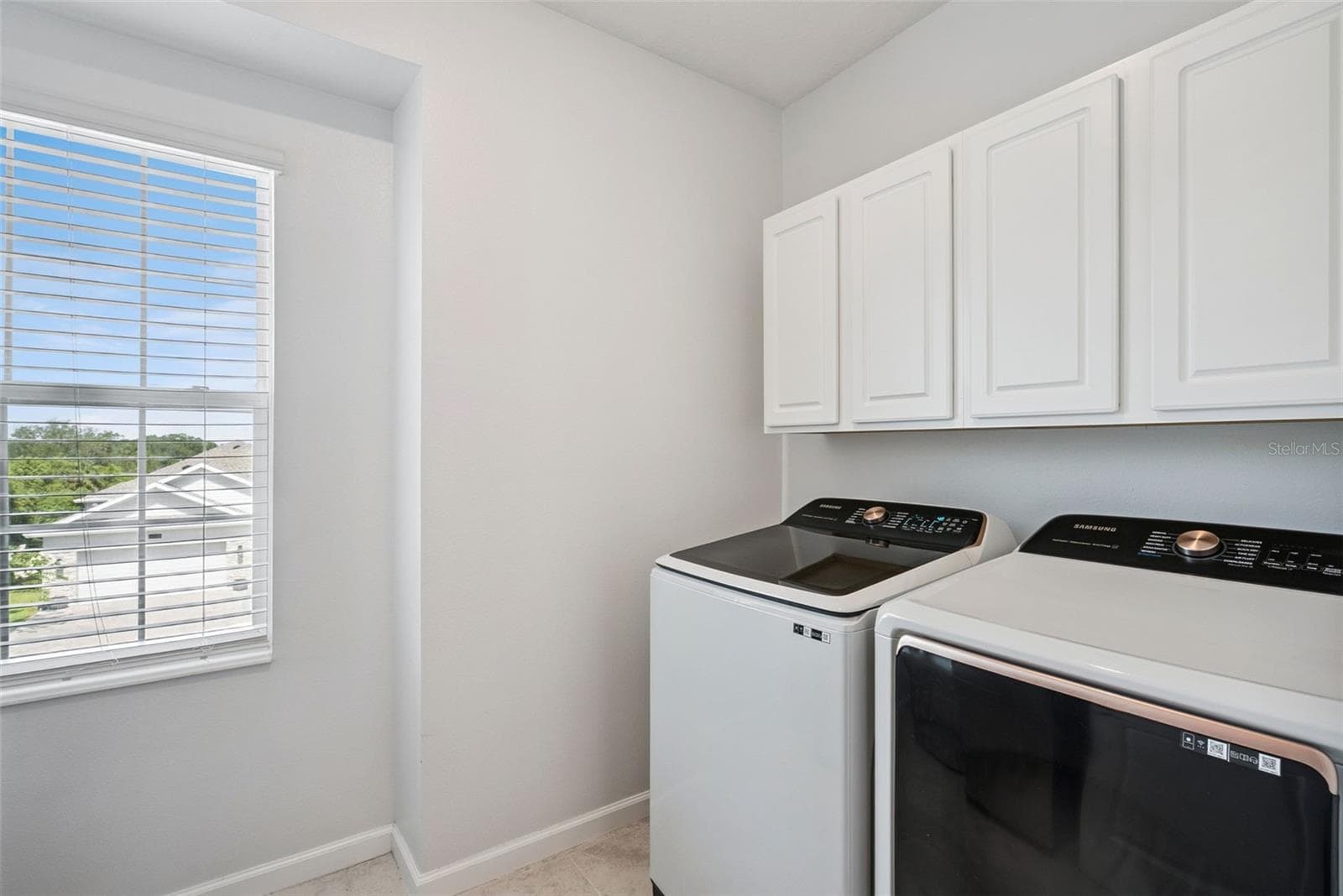Upstairs laundry room with washer and dryer included - 1235 DORA PARC LN, MOUNT DORA