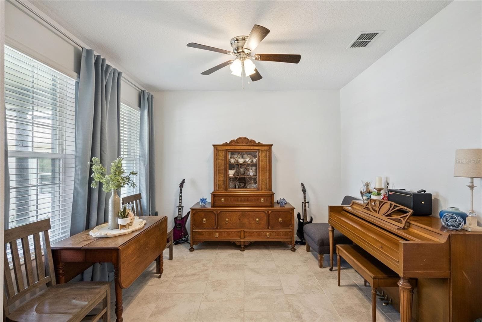 Downstairs Bonus space for playroom, media, or home office - 1235 DORA PARC LN, MOUNT DORA